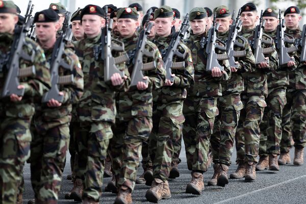 JUDE COLLINS: Ireland marches along as the drumbeat of war grows louder