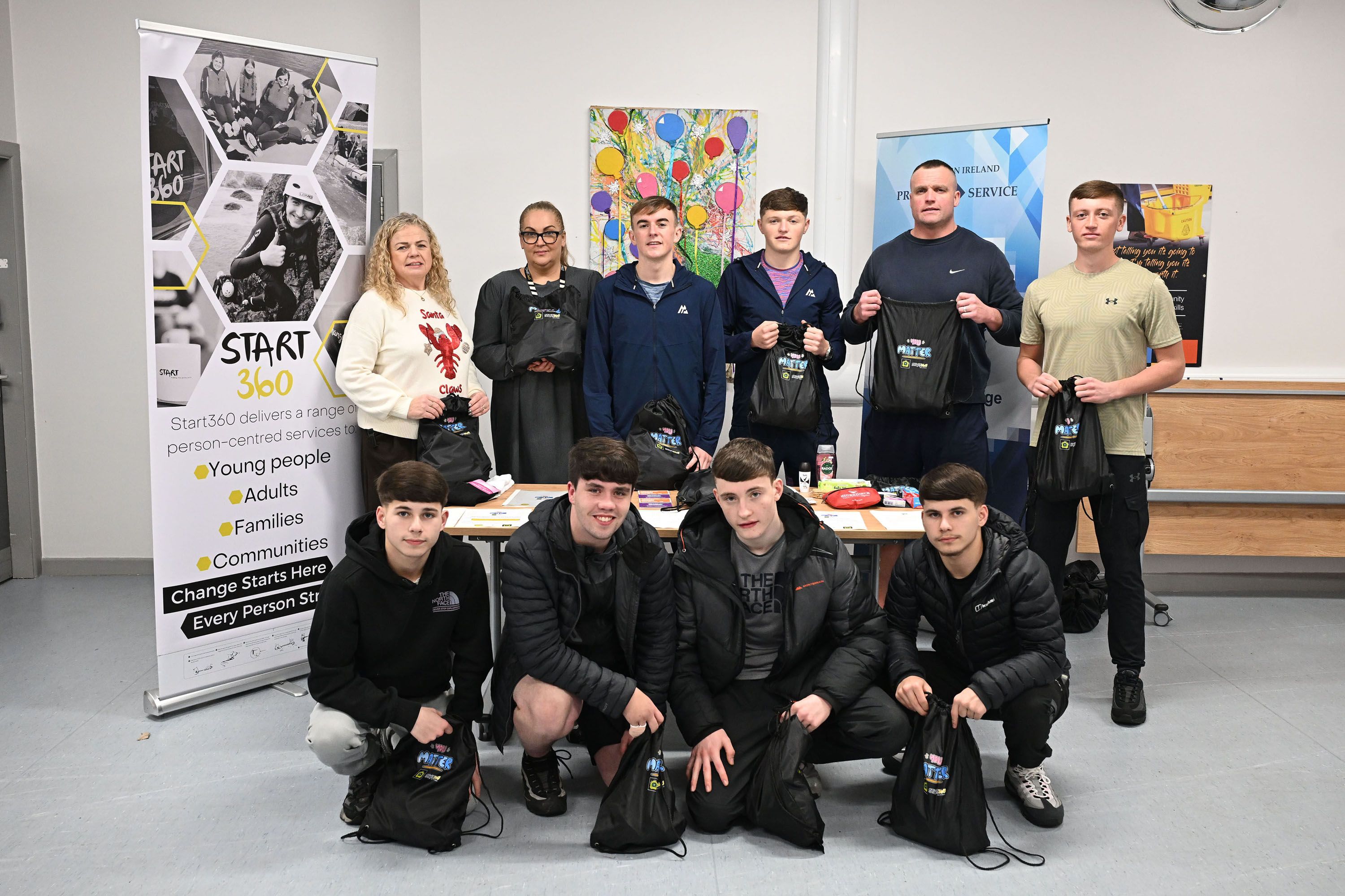 TEAMWORK: Ardoyne Youth Club members with Seaneen Farrelly, Hydebank Wood Prisoner Development Unit Governor, Grainne Griffith, Start 360, and Stephen Konrad, Ardoyne YC Youth Worker
