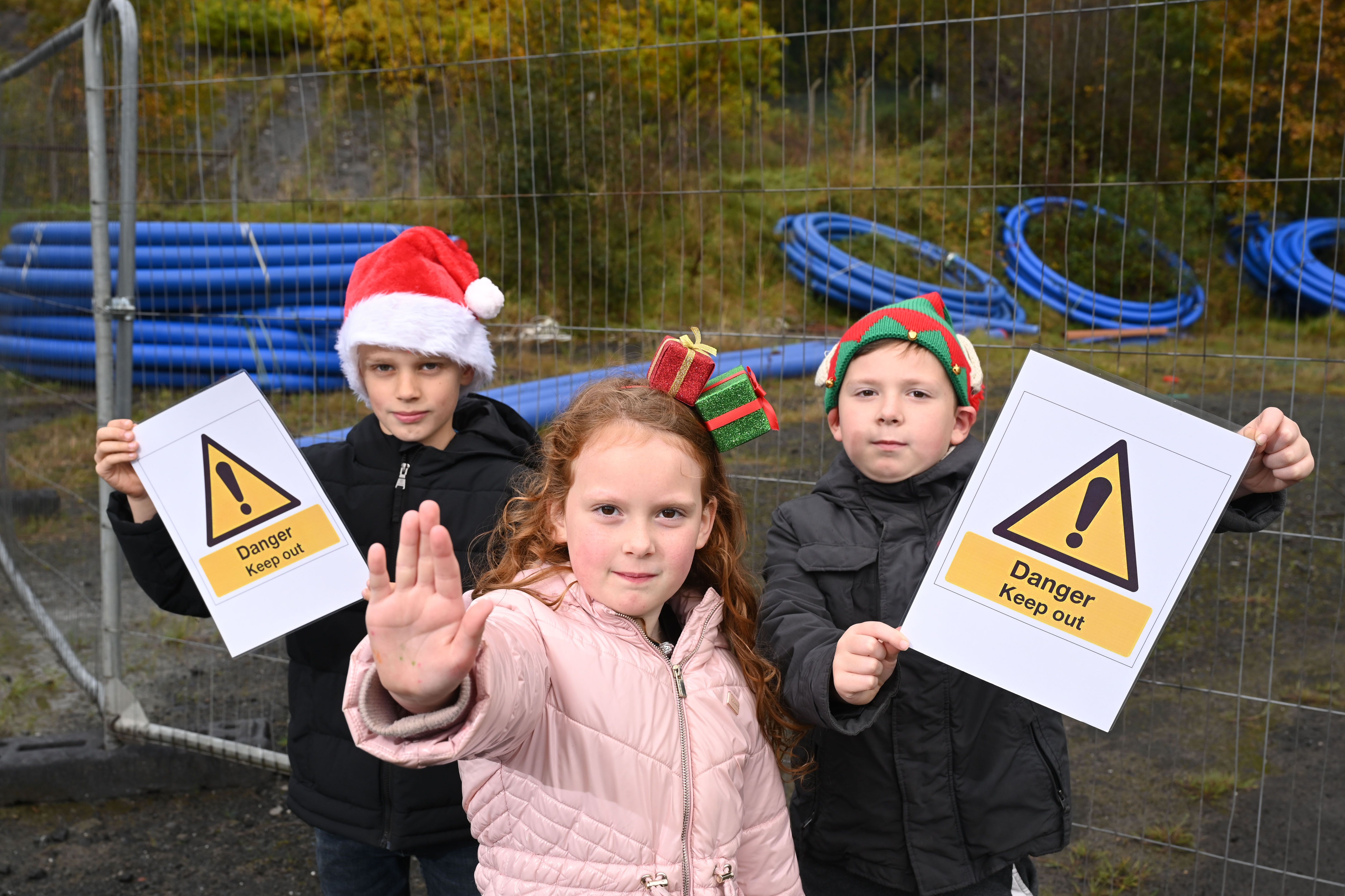 NO-GO: Cienna McCabe, Jace McCabe and Jack Killen are advising young people to stay away from water at Christmas