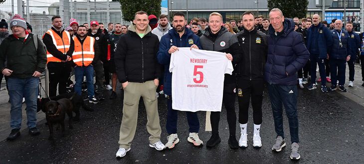 SPONSORED WALK: Family, friends, supporters and staff from Linfield and Cliftonville took part in the charity walk