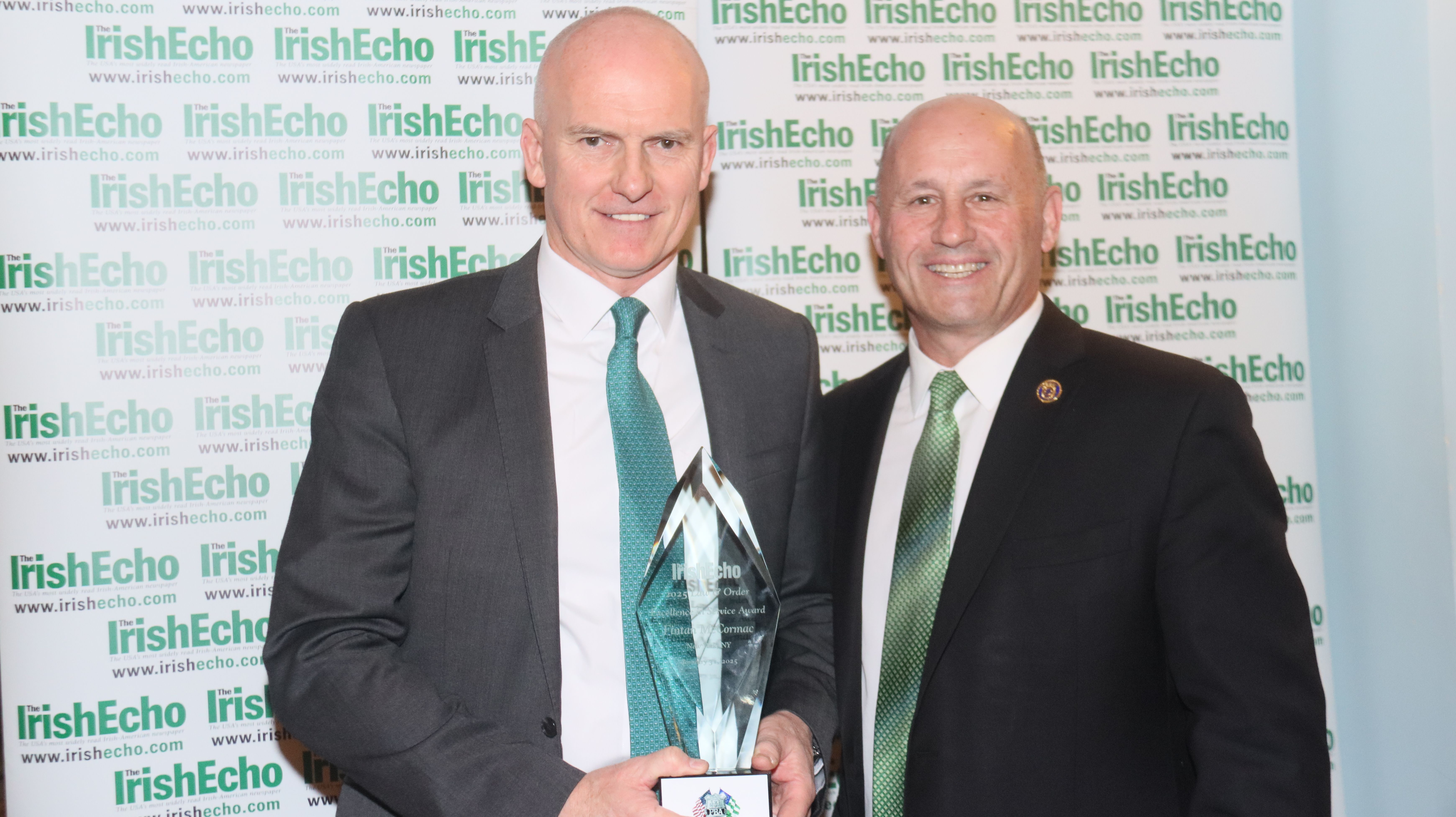 AMERICAN COP: Detective Sergeant Fintan McCormac receives the Excellence in Service Award from Nassau County Police Commissioner Patrick Ryder