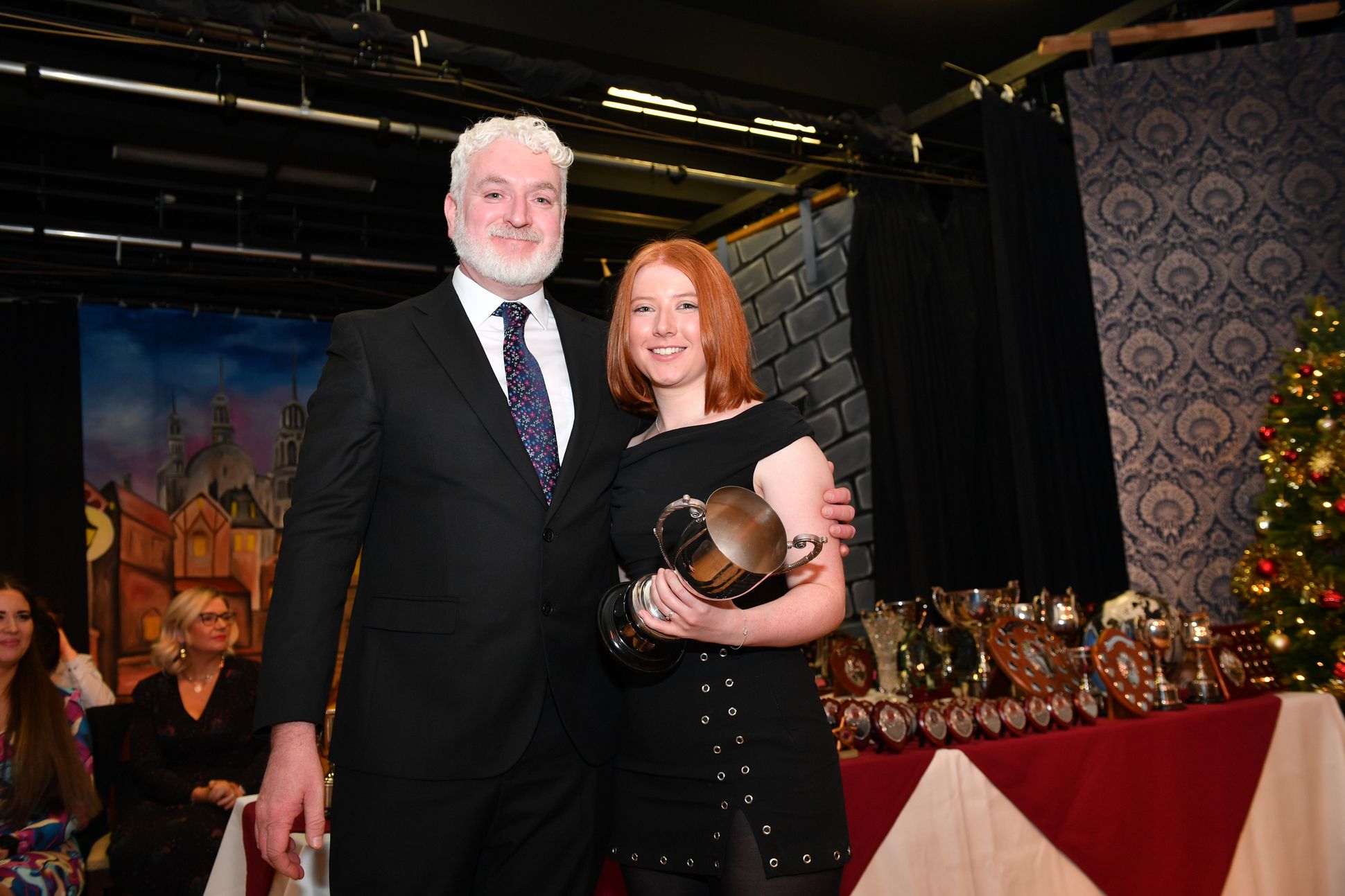 Mr McNeill presents Olivia Napier with the Sr Pauline Henry Trophy