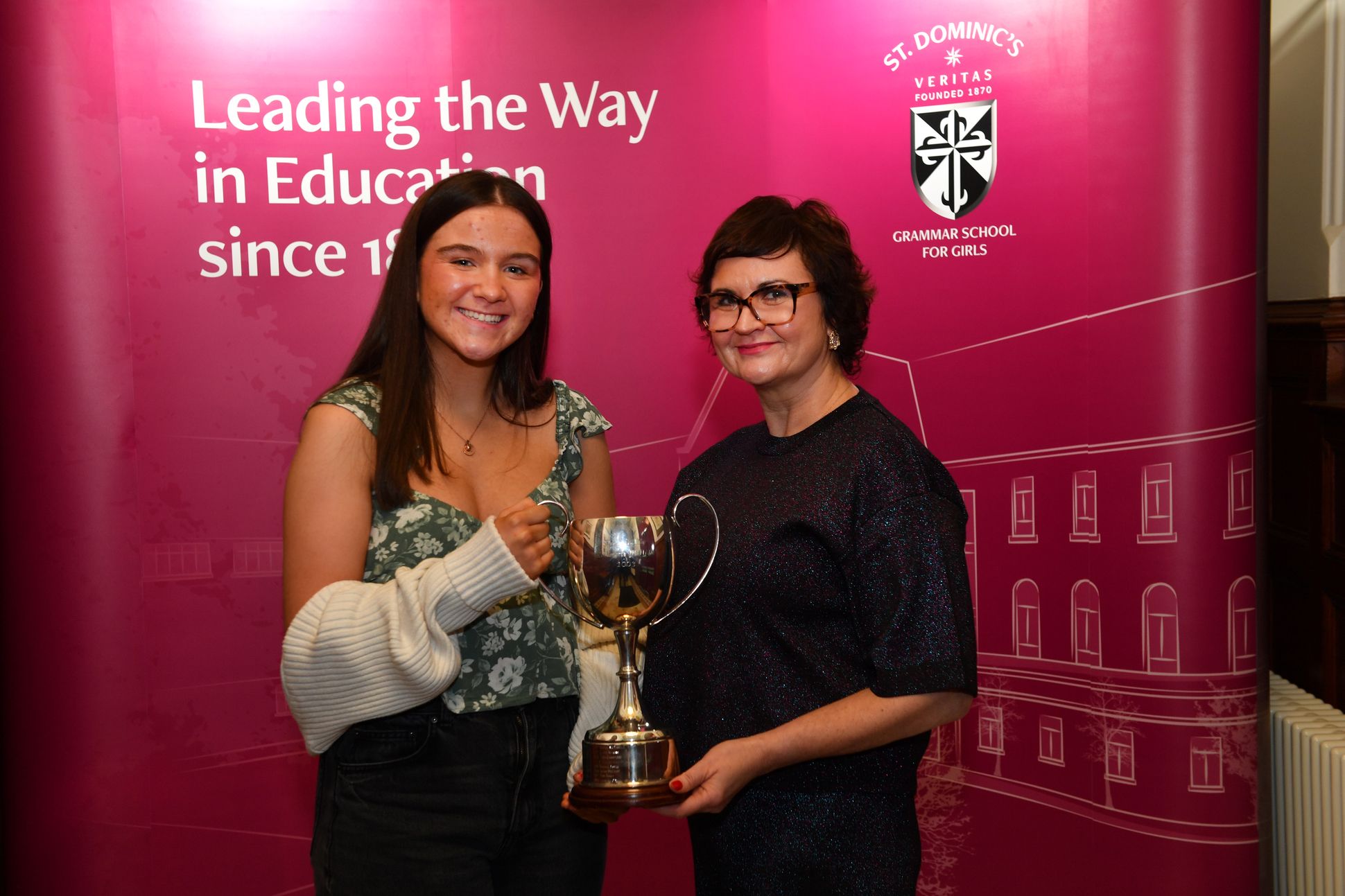 Mrs Murphy presents Sarah Smith with the McArdle Cup for Business Studies