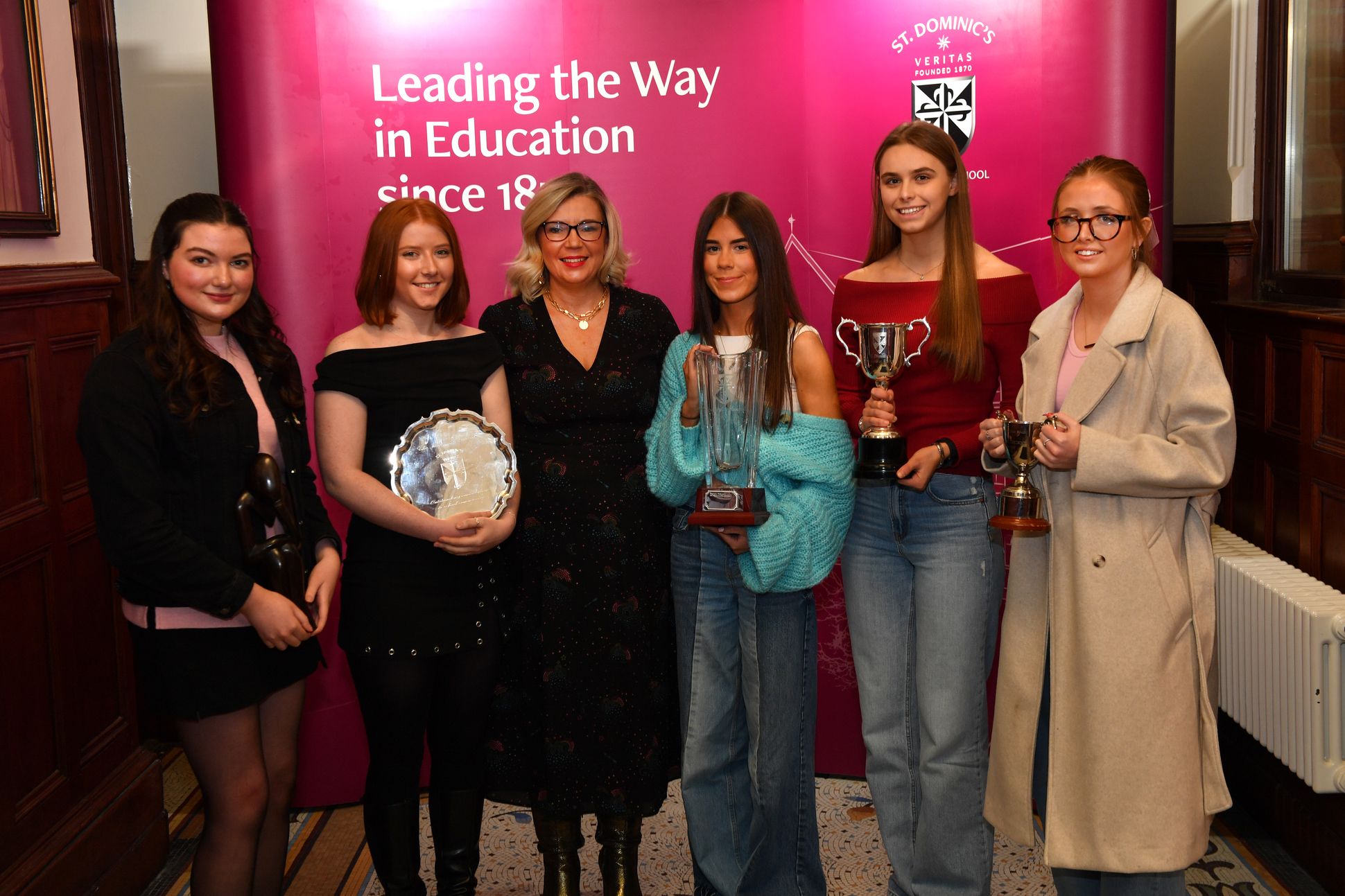 Mrs Wilson presents special awards to Ciara Donnelly, Olivia Napier, Cara McFadden, Dervla Crilly McAufield and Robyn McCloskey