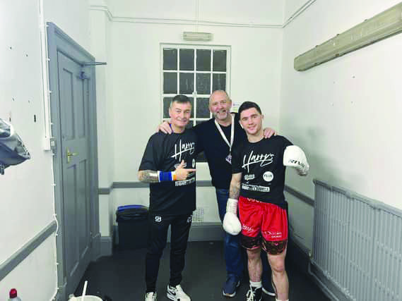 Mark Dunlop (centre) with the late John Cooney prior to a fight last October