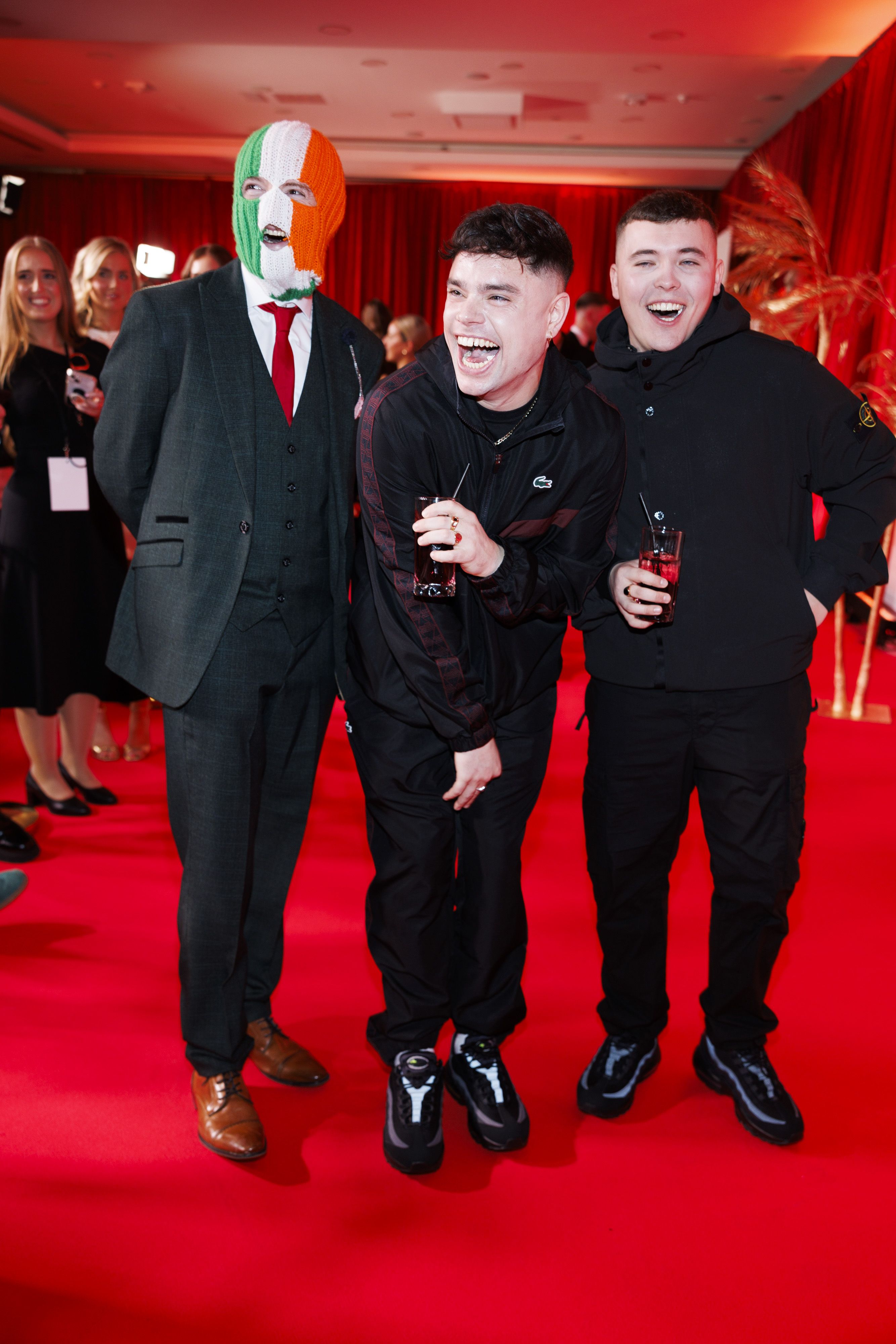 HAVING THE CRAIC: Kneecap strut their stuff on the red carpet last night