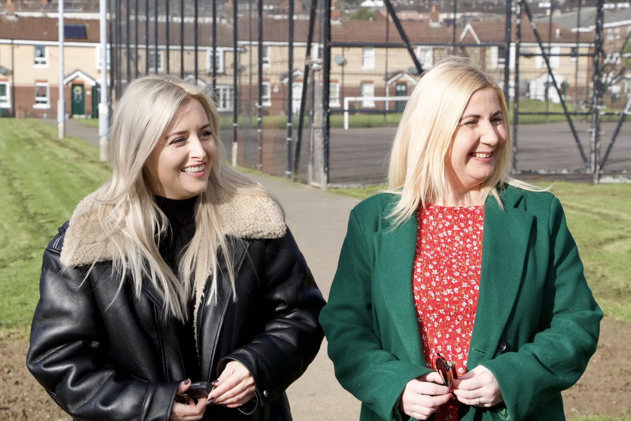 VISIT: Sinn Féin MLA Órlaithí Flynn and Councillor Siobhán McCallin at St Oliver Plunkett FC pitch in Lenadoon