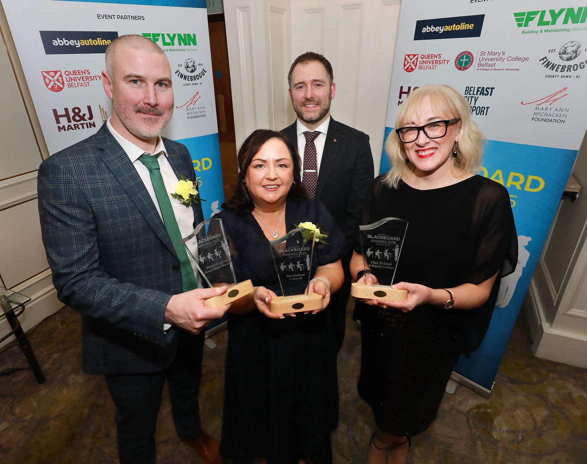 Míchéal Ó Conghaile (Bunscoil Bheann Mhadagáin), Mary Harbinson (St. Mary's PS) and Clare McGrath (St Malachy's College) with Prof Daniel Muijs (Head of the School of Social Sciences, Education and Social Work, QUB) 