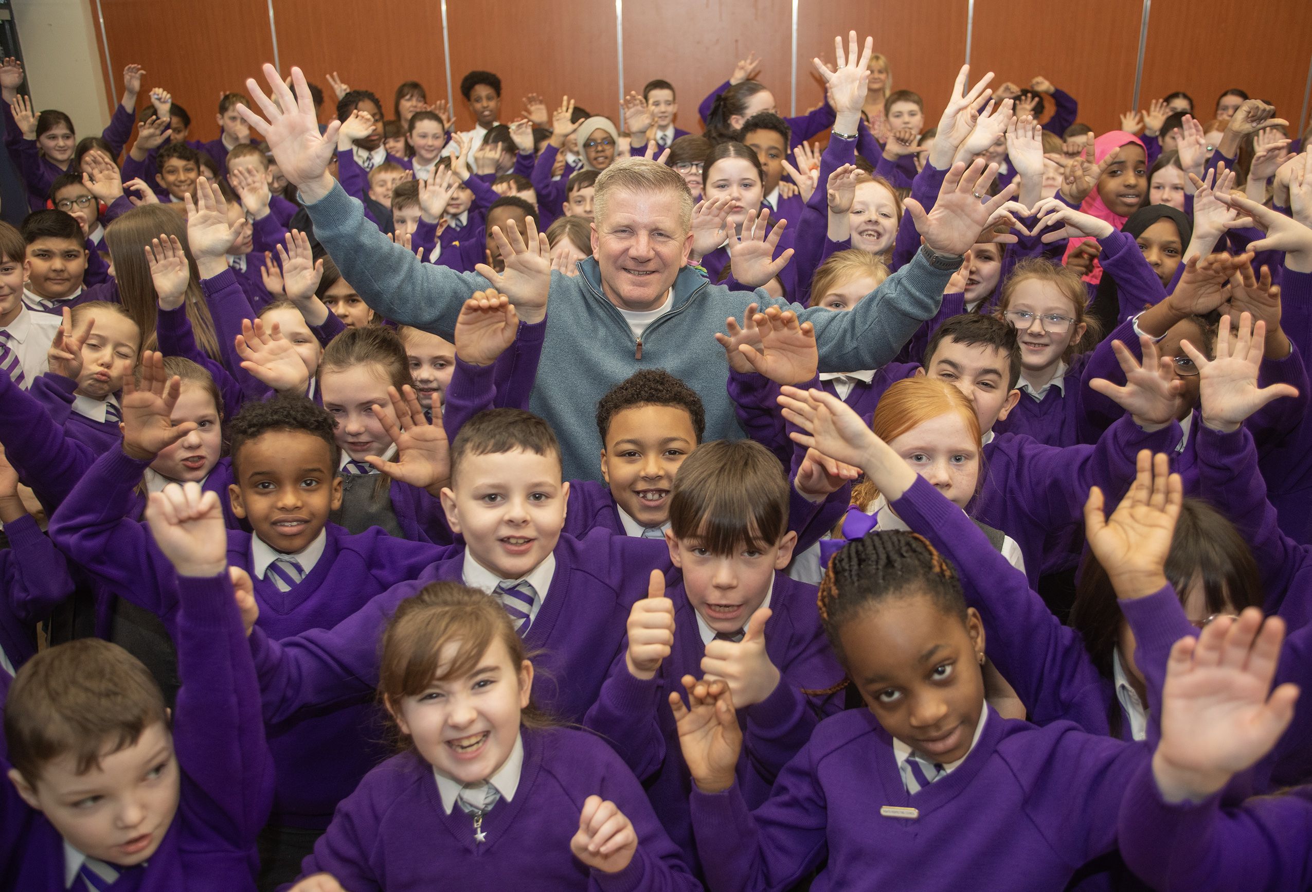 VISIT: Commissioner for Children and Young People Chris Quinn with pupils at St Clare\'s PS