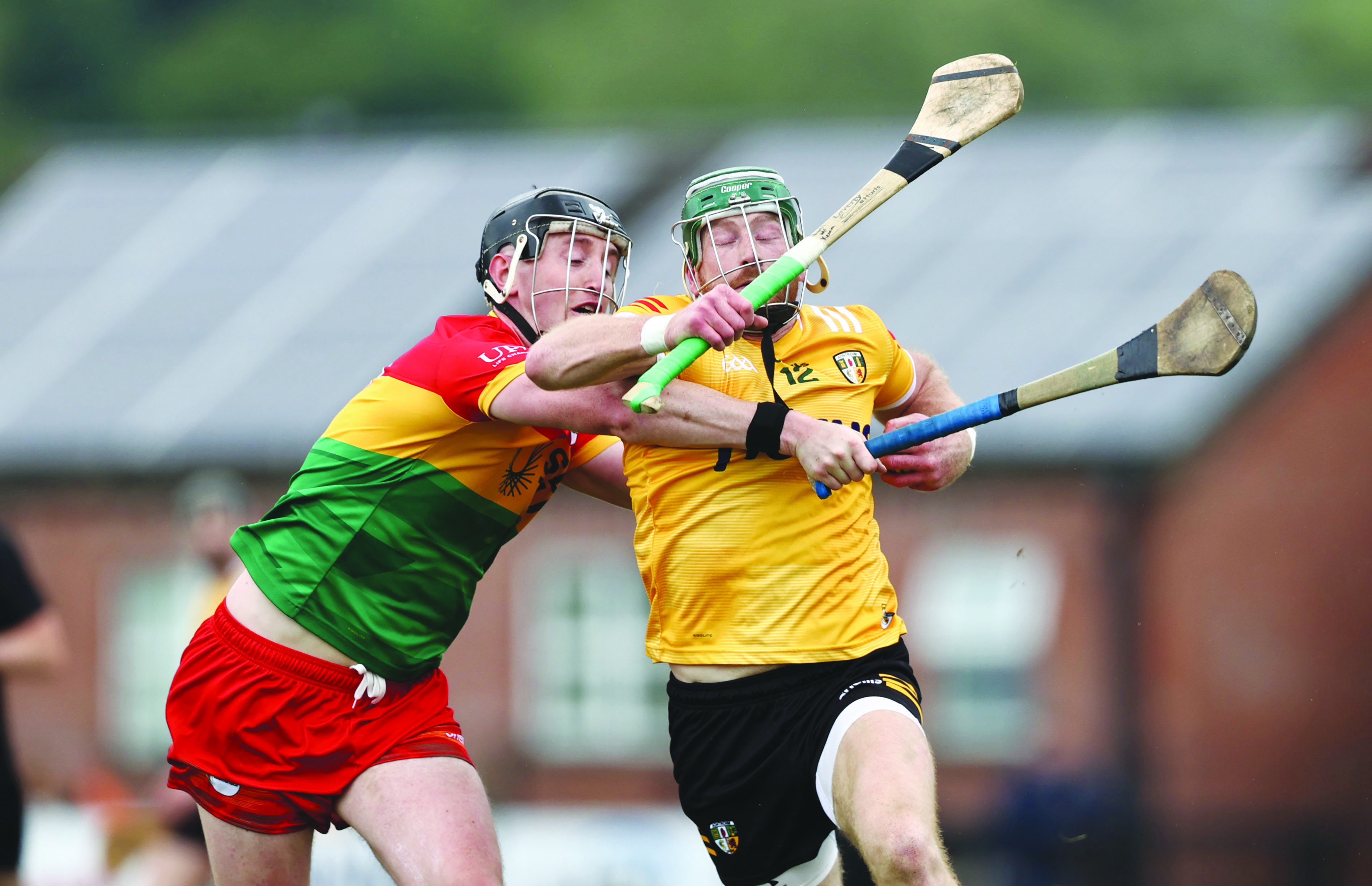 Niall McKenna, pictured being challenged by Tony Lawlor during Antrim’s win over Carlow in last year’s Leinster Championship, is out for six weeks with injury