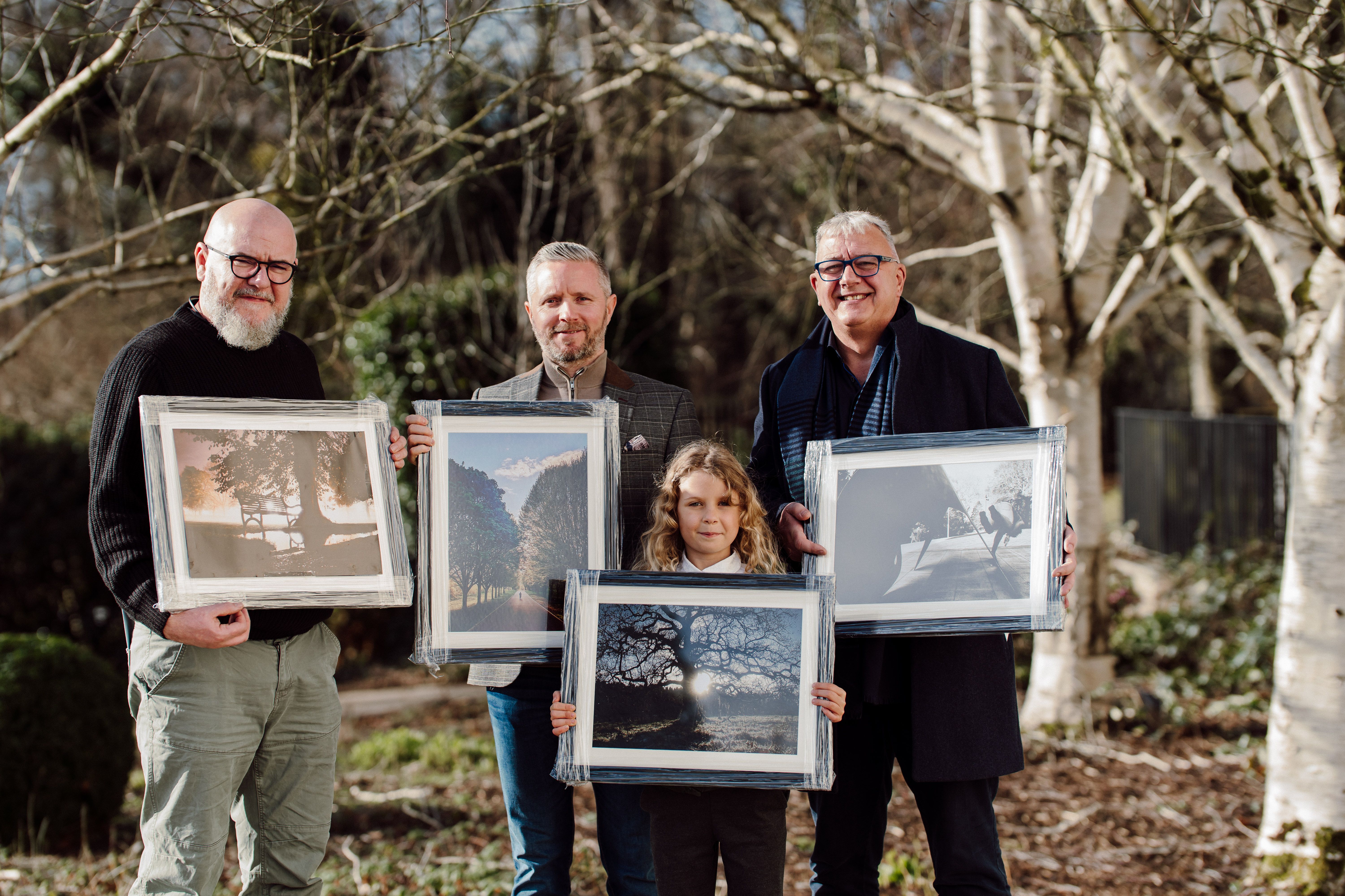 (L-R) Stephen Martin (Ormeau Park – Seasons in our Parks 1st place); Richard Elley (Falls Park – Park Landscapes 1st place);  Zoia Wilkowska (Lagan Meadows – Under 16s 1st place; and David Mills (Botanic Gardens- People and Parks 1st place