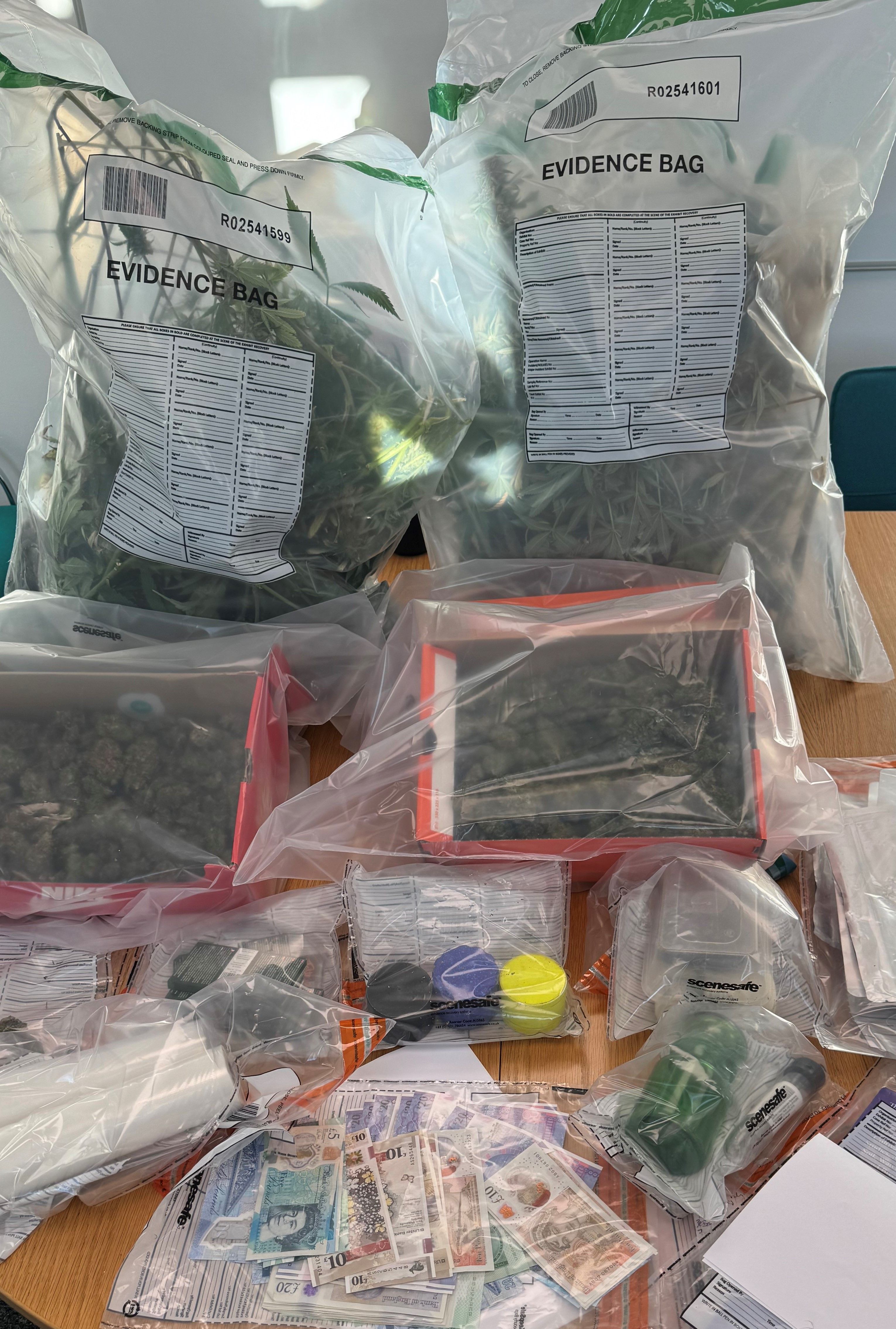 OFF THE STREETS: Suspected Class B controlled drugs, approximately £1,000 in cash and other items seized from a property in the Glenkeen area 