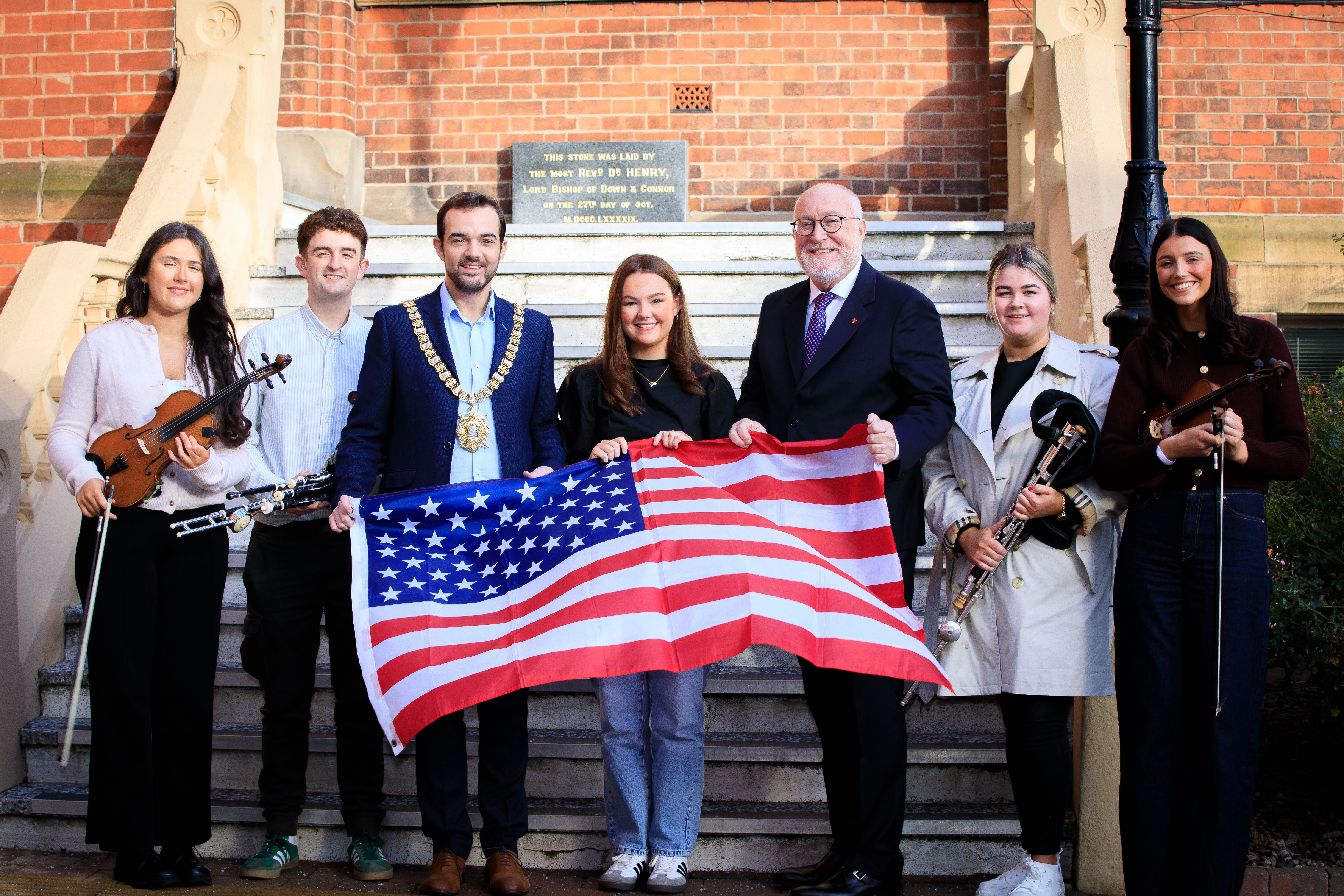 LE CHÉILE: Belfast Lord Mayor Micky Murray and St Mary’s University College Principal Prof. Peter Finn with the St Mary’s student teachers who will be travelling to Music City USA to take part in the Belfast to Nashville St Patrick’s Day celebrations 