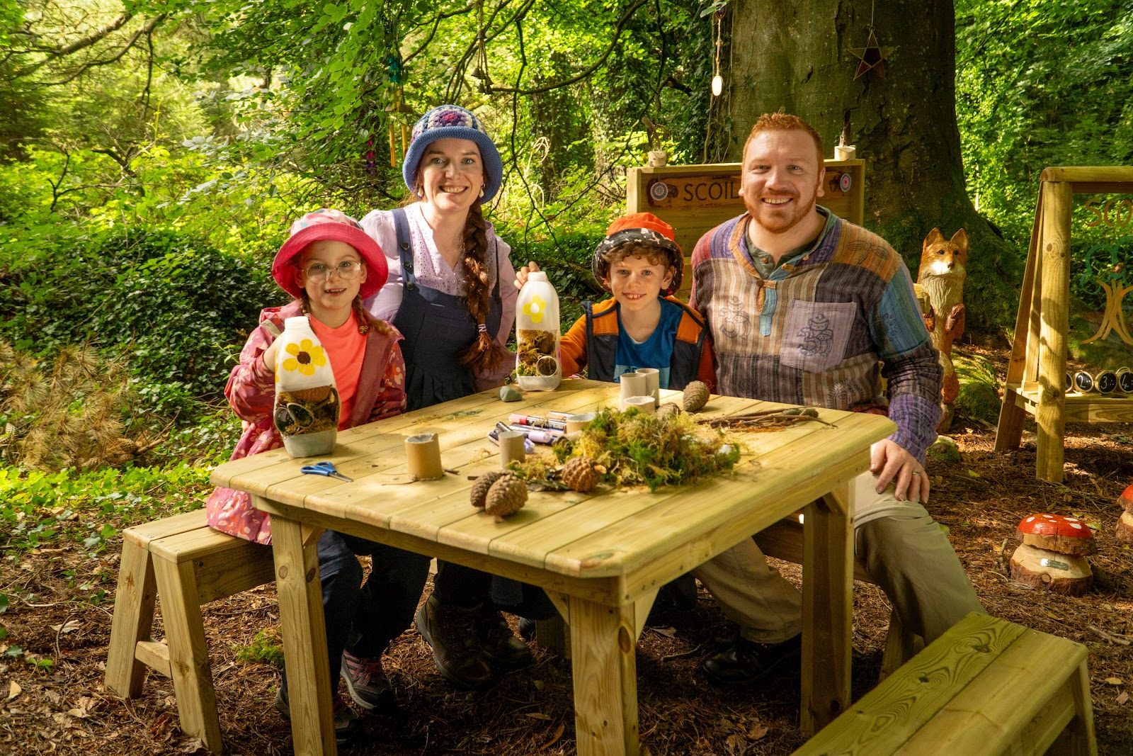 FOREST FAMILY: Gráinne among the trees in Tollymore Forest Park with husband Frainc and children Naoise (9) and Síomha (7)