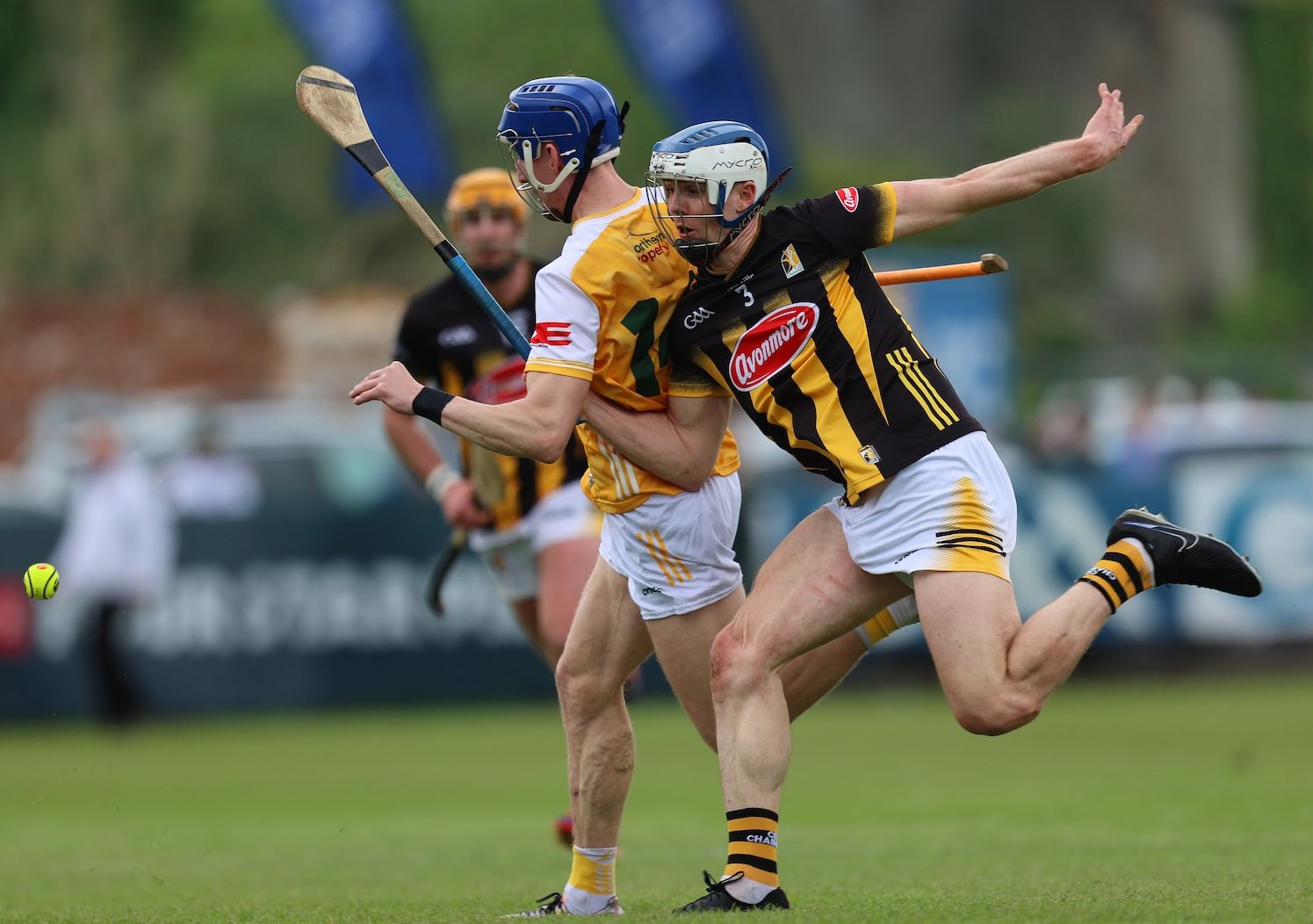 Huw Lawlor tackles James McNaughton at Corrigan Park on Sunday 