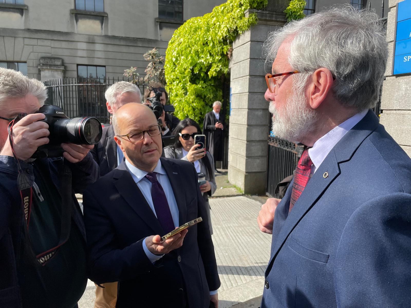 ADAMANT: Gerry Adams speaking to the press outside court this morning