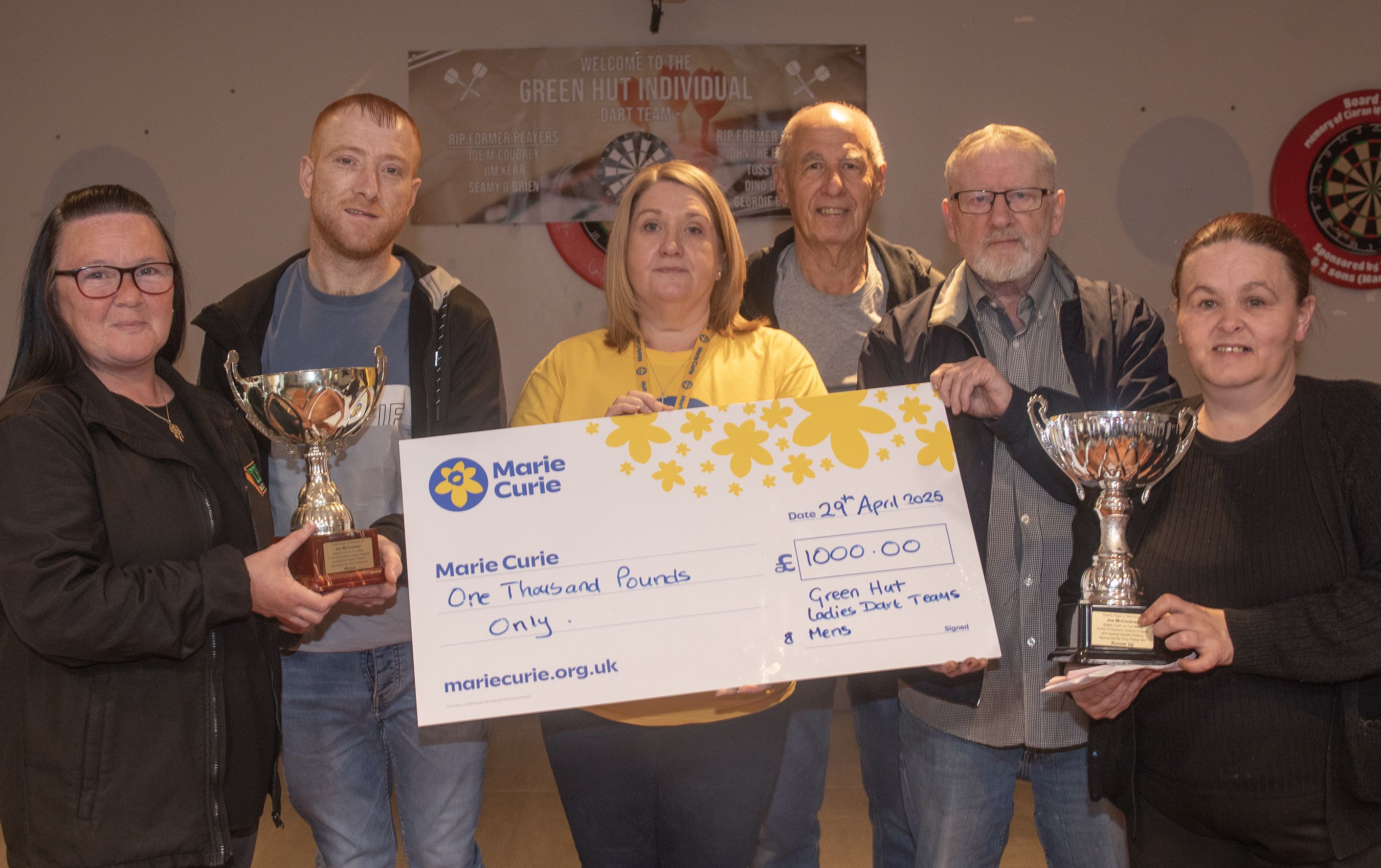 CHEQUE PRESENTATION: The cheque was presented for £1,000 to Marie Harris, from Marie Curie charity
