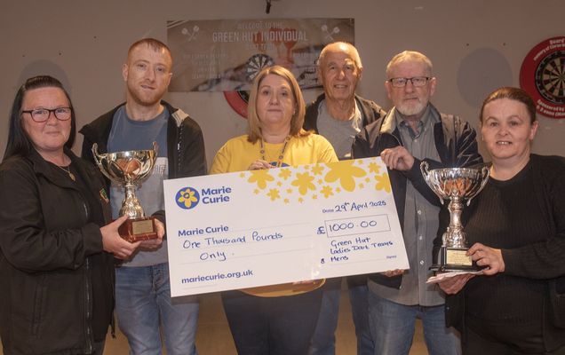 Turf Lodge charity darts night raises £1,000 for Marie Curie