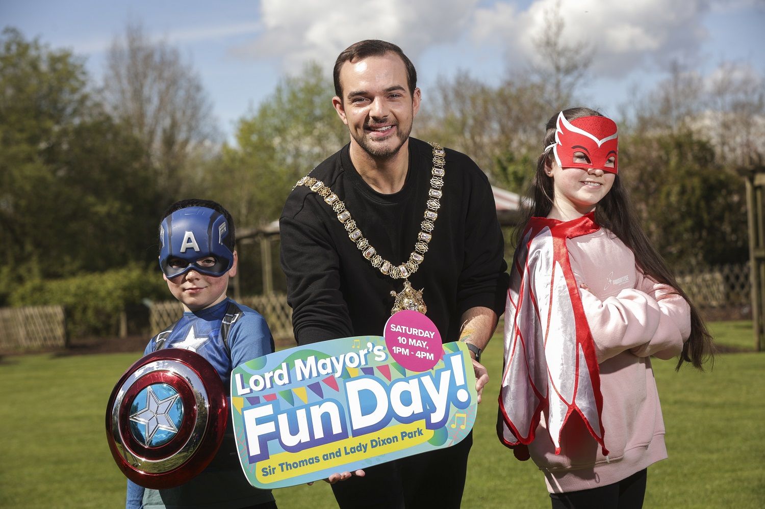FUN DAY: Junior superheroes Ruairi and Olivia McKee with the Lord Mayor of Belfast, Councillor Micky Murray