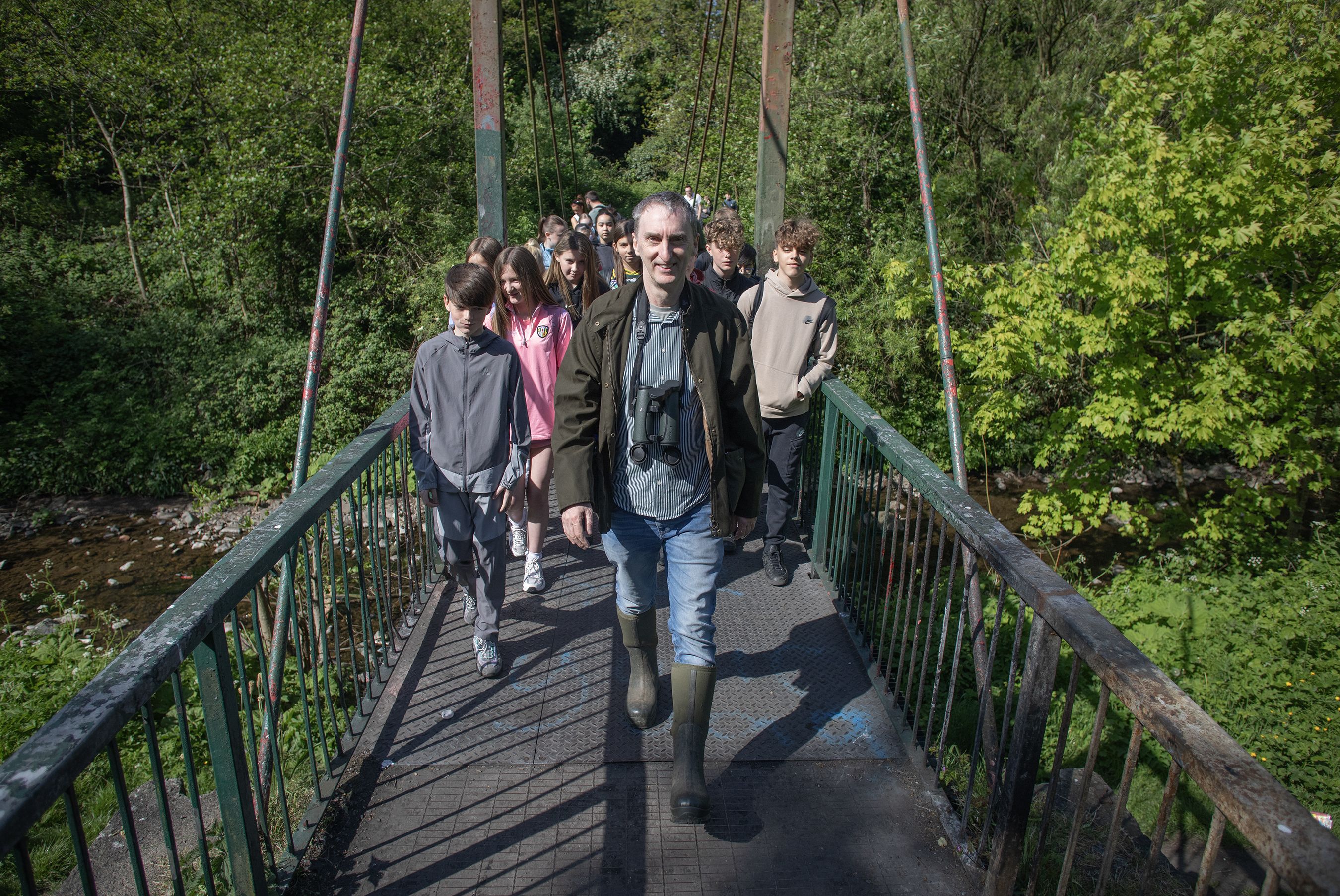 INTO THE WILD: Gearóid Ó Muilleoir with the group of young Gaeilgeoirí in Colin Glen
