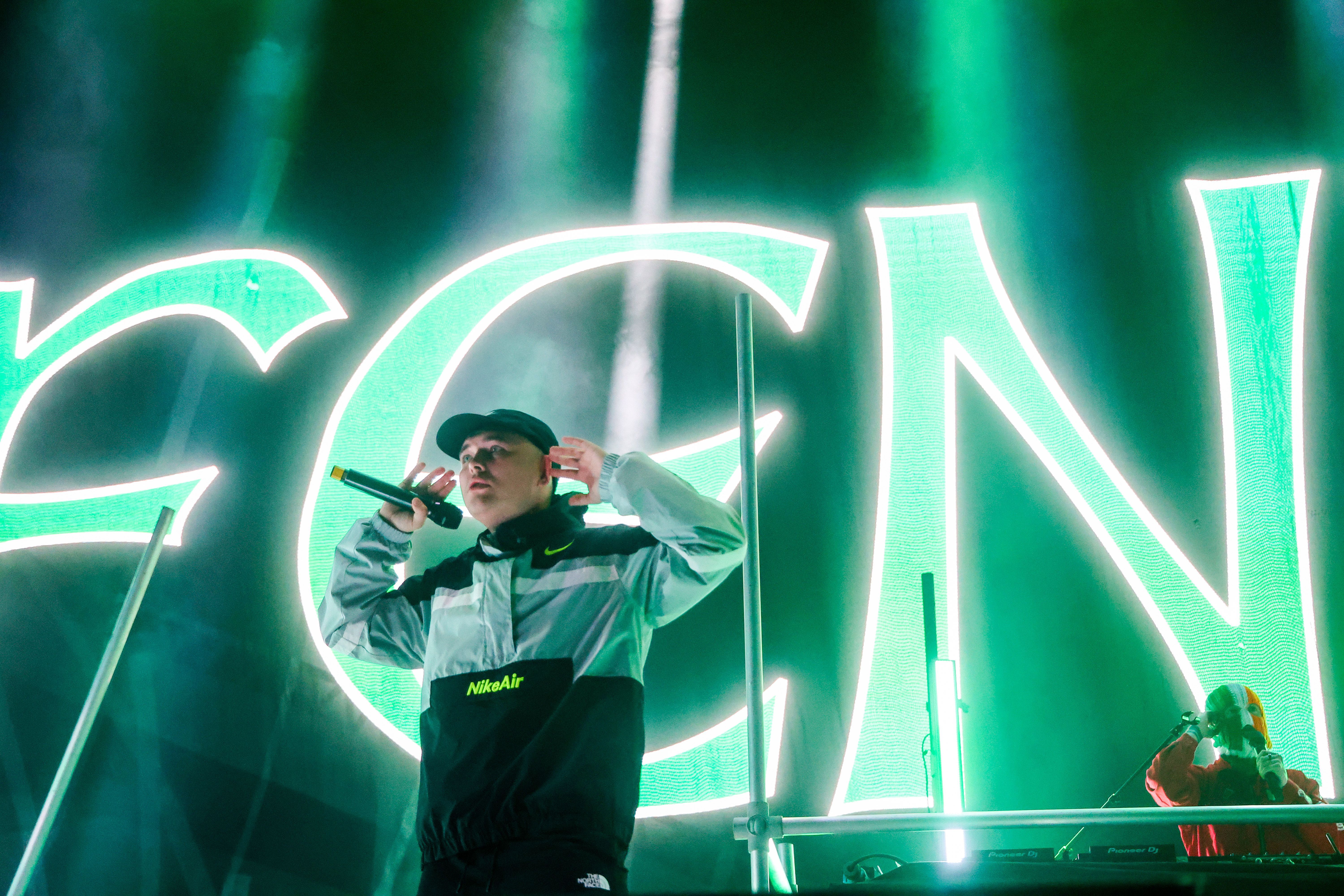 CHARGED: Kneecap\'s Liam Óg Ó hAnnaidh on stage at Belfast\'s SSE Arena