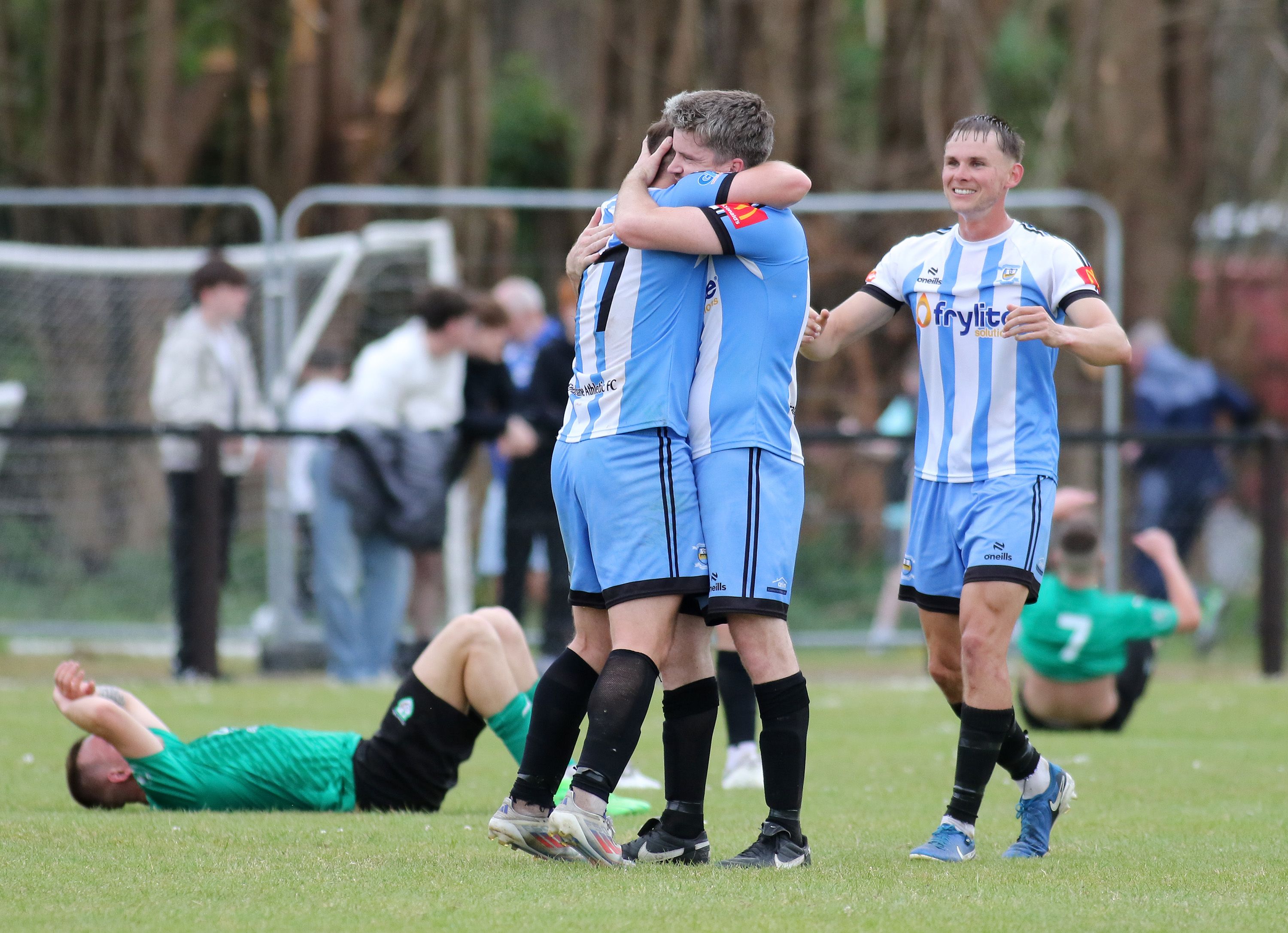 Strabane Athletic players celebrate at the final whistle