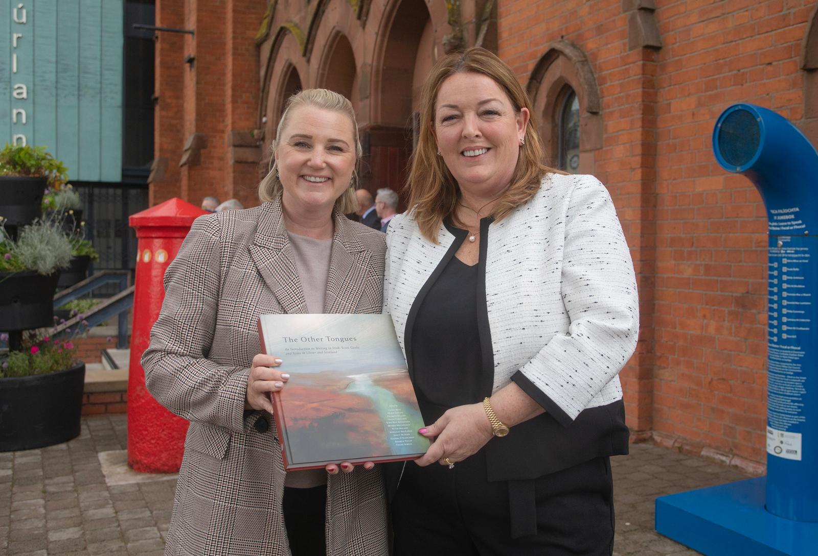 LEARNING FROM WEST WORK EXPERIENCE: Tina McKenzie accepts a gift from Connla McCann to as a token of appreciation from the West Belfast Small Business Roundtable after today\'s address