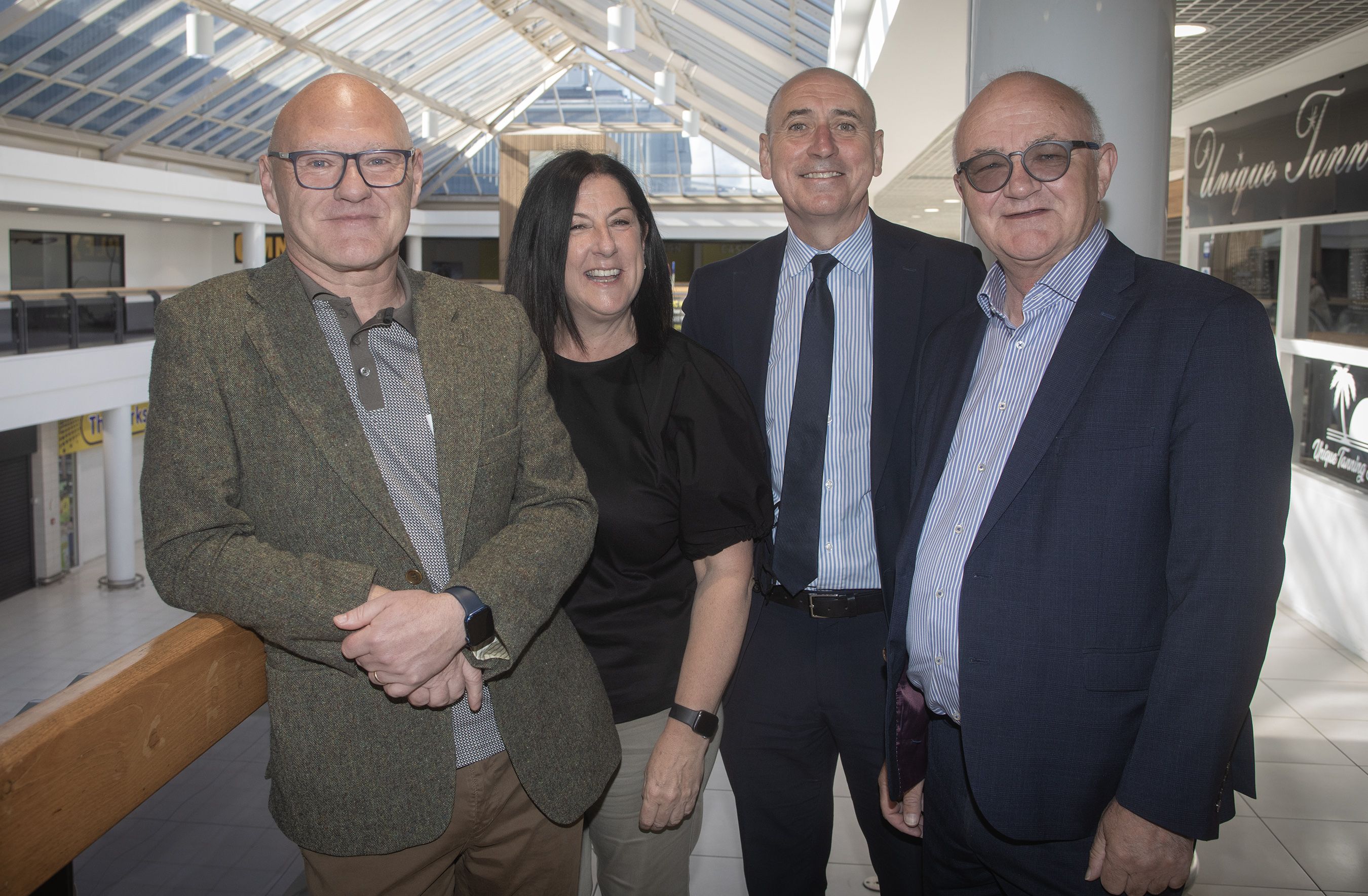 EDUCATION IS THE FUTURE: West Belfast MP Paul Maskey, Angie Mervyn from West Belfast Partnership Board, with Terry McCrudden and Brian McCrory