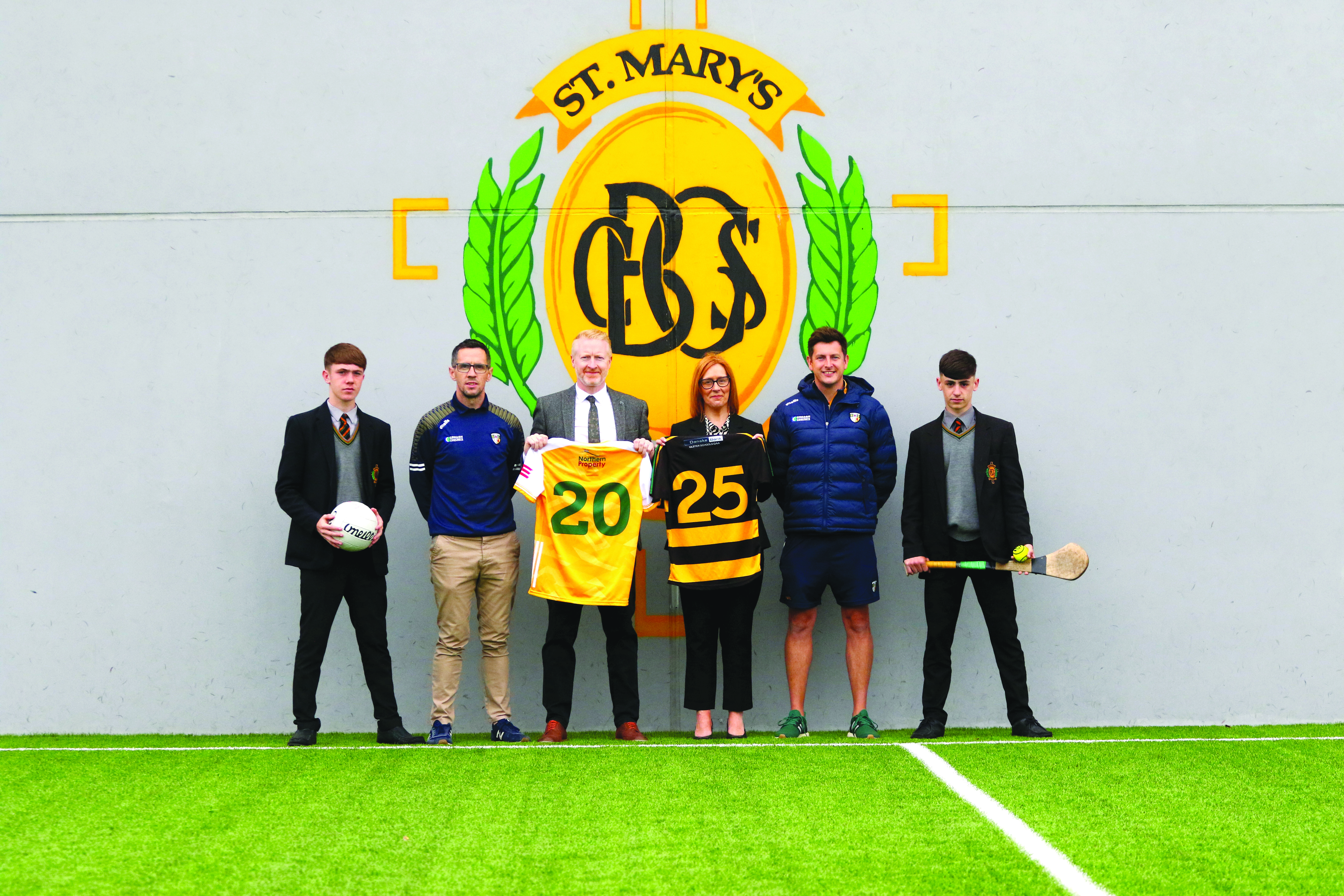 Pictured at St Mary’s CBGS are pupils Matthew O’Neill and Padraig Kelly with (L-R): Alfie Hannaway; Antrim GAA Head of Games; Brendan McComb, St Mary’s CBGS Principal; Amanda Barr; Pastoral VP; Paul Law, Gaelfast Games Promotion Officer
