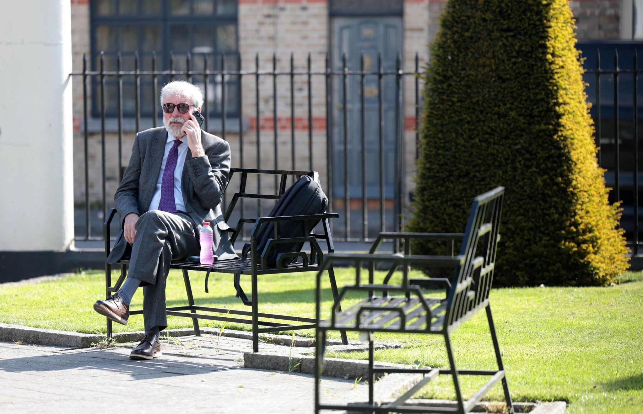 KNOWING OUR PLACE: Gerry Adams takes a call after his libel case win in Dublin on Friday past