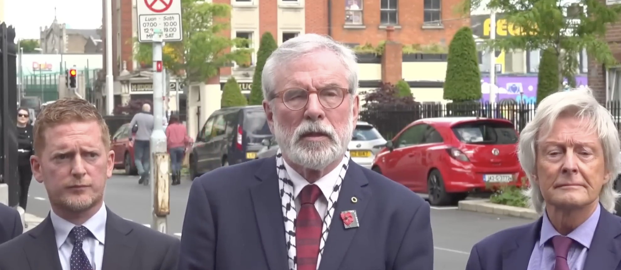 WINNER\'S ENCLOSURE: Gerry Adams and his legal team outside the Four Goldmines, sorry Four Courts, in Dublin after the verdict