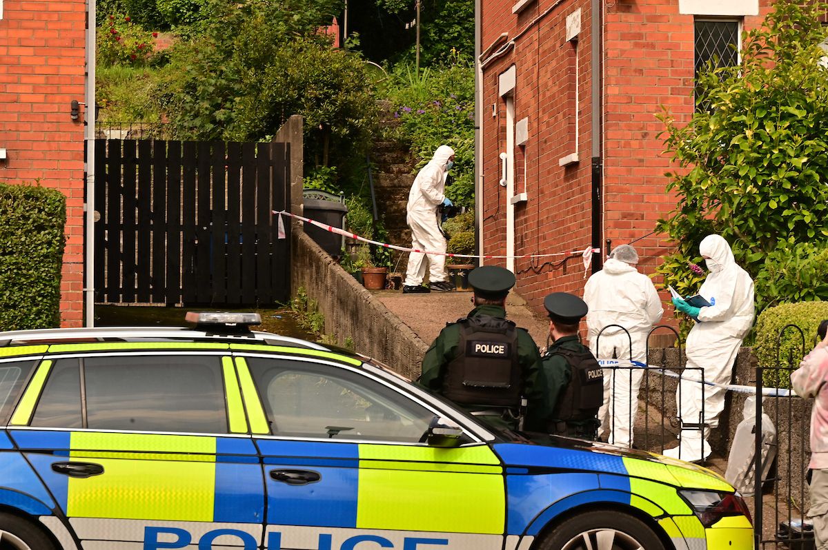 MURDER INVESTIGATION: Police and forensics at the scene on Tuesday afternoon