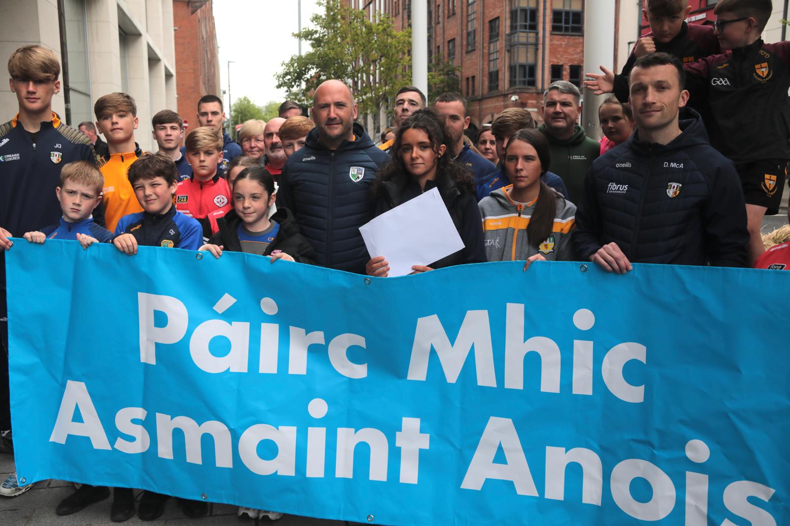 CASEMENT NOW: South Antrim GAA reps are joined by young Gaels from Antrim GAA clubs outside Erskine House on Thursday