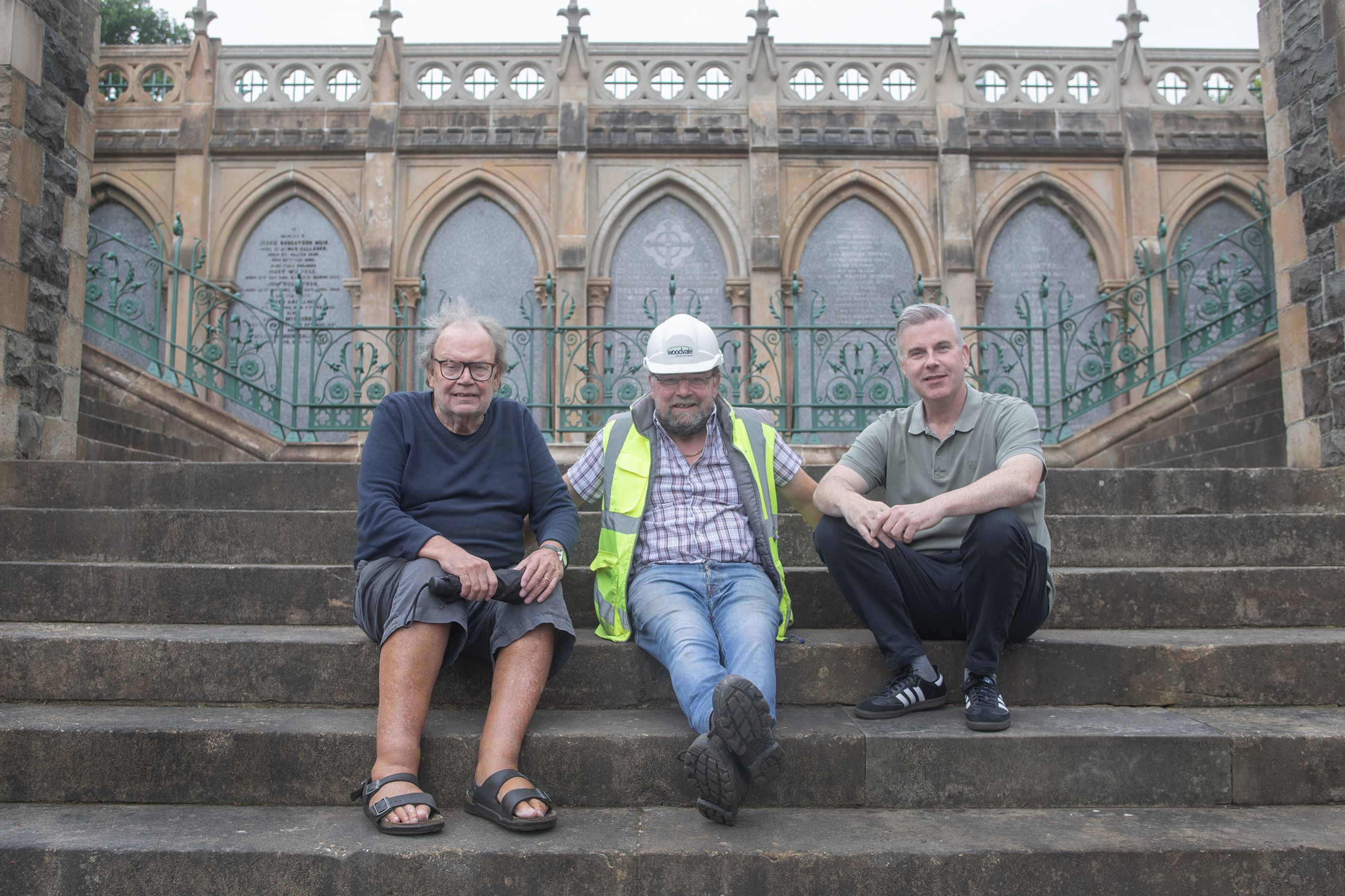 REFURB COMPLETE: Tom Hartley, Desie Brennan (Woodvale Construction) and Stevie Corr at Central Steps in City Cemetery
