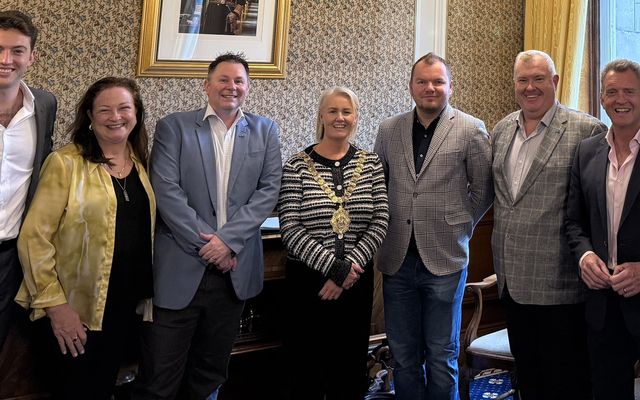 Irish from Oz return to Belfast and make good on investment pledge