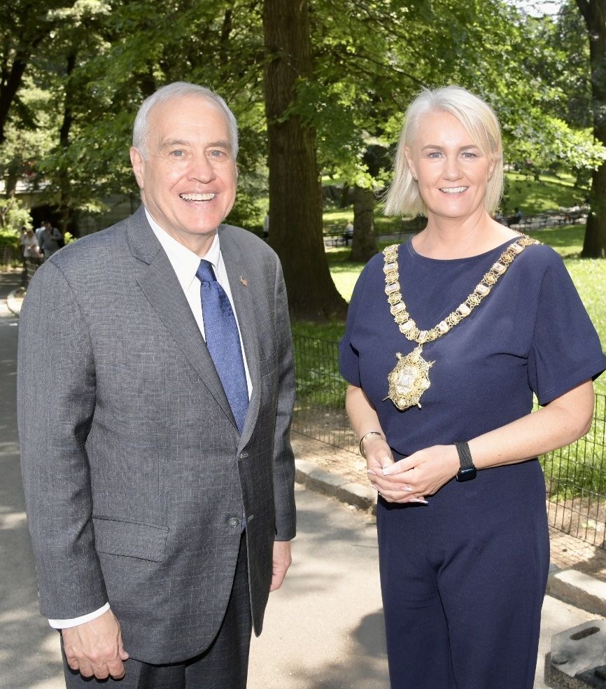 FRONT AND CENTRAL: NY Comptroller Tom DiNapoli chatting with Lord Mayor of Belfast Tracy Kelly at the entrance to Central Park in New York