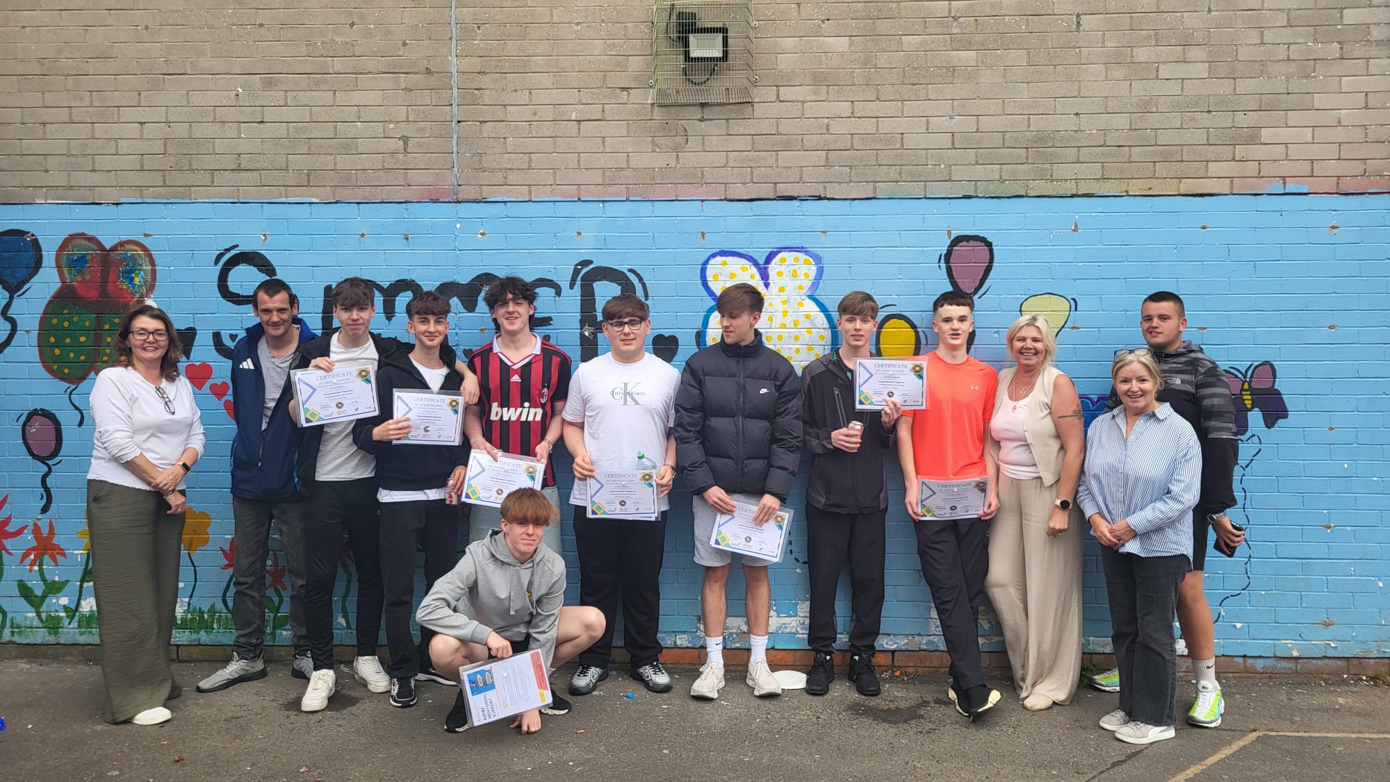 YOUNG AMBASSADORS: Some of the participants of the programme from St Luke\'s FC with coach Colm McAuley and CRJI’S Jane Young