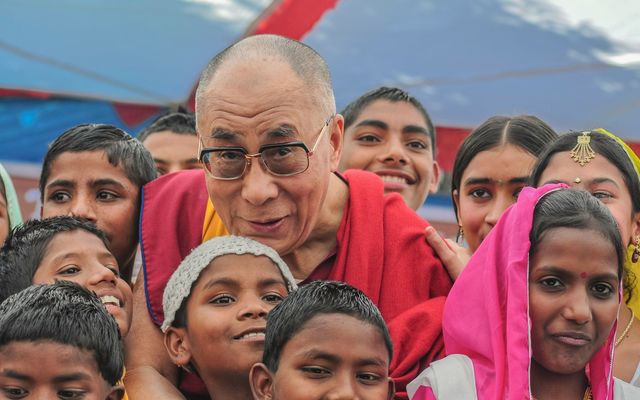 MINDFUL MOMENT: That Dalai Lama can be a ticklish fellow!