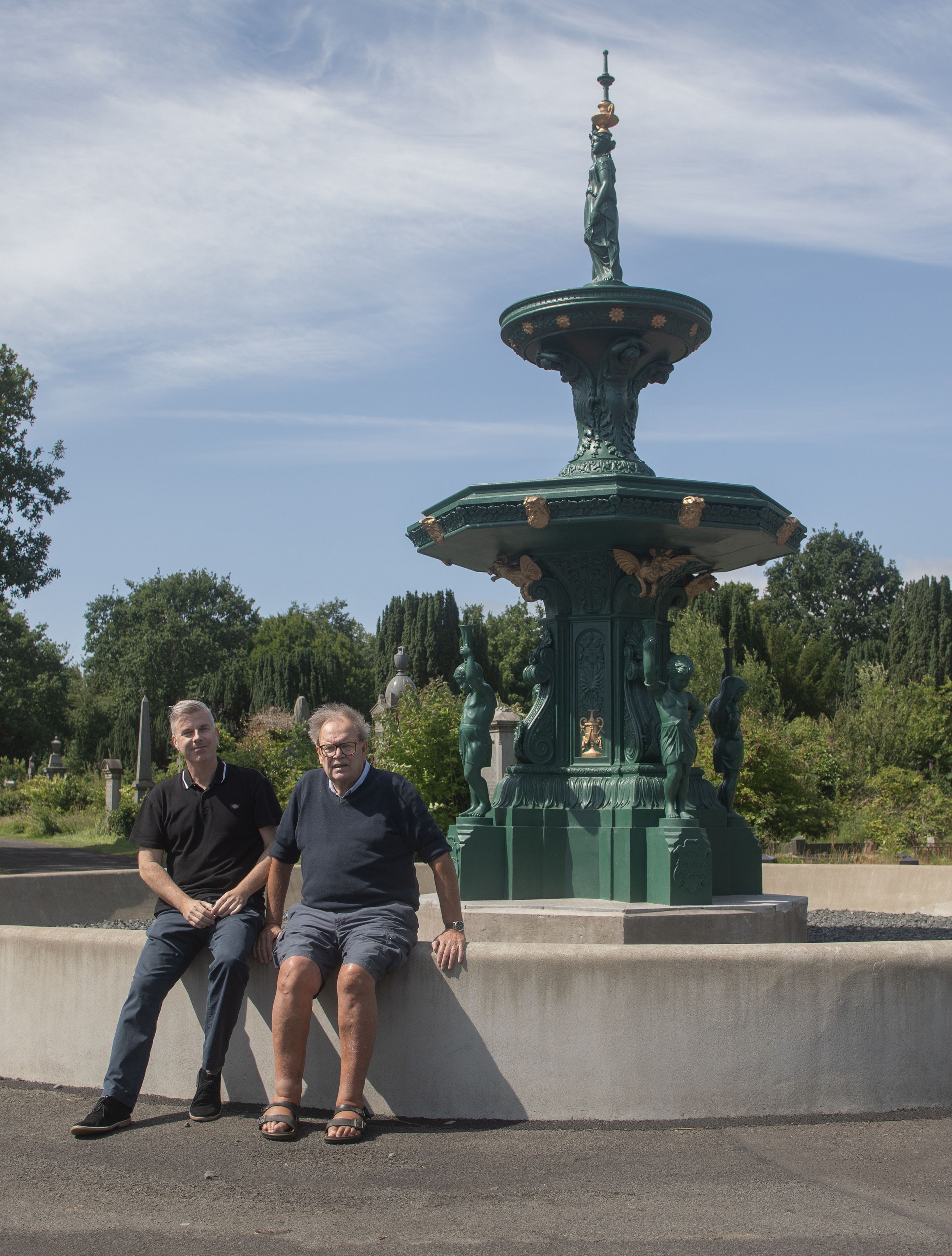 RESTORATION: Steven Corr and Tom Hartley at the fountain in Belfast City Cemetery
