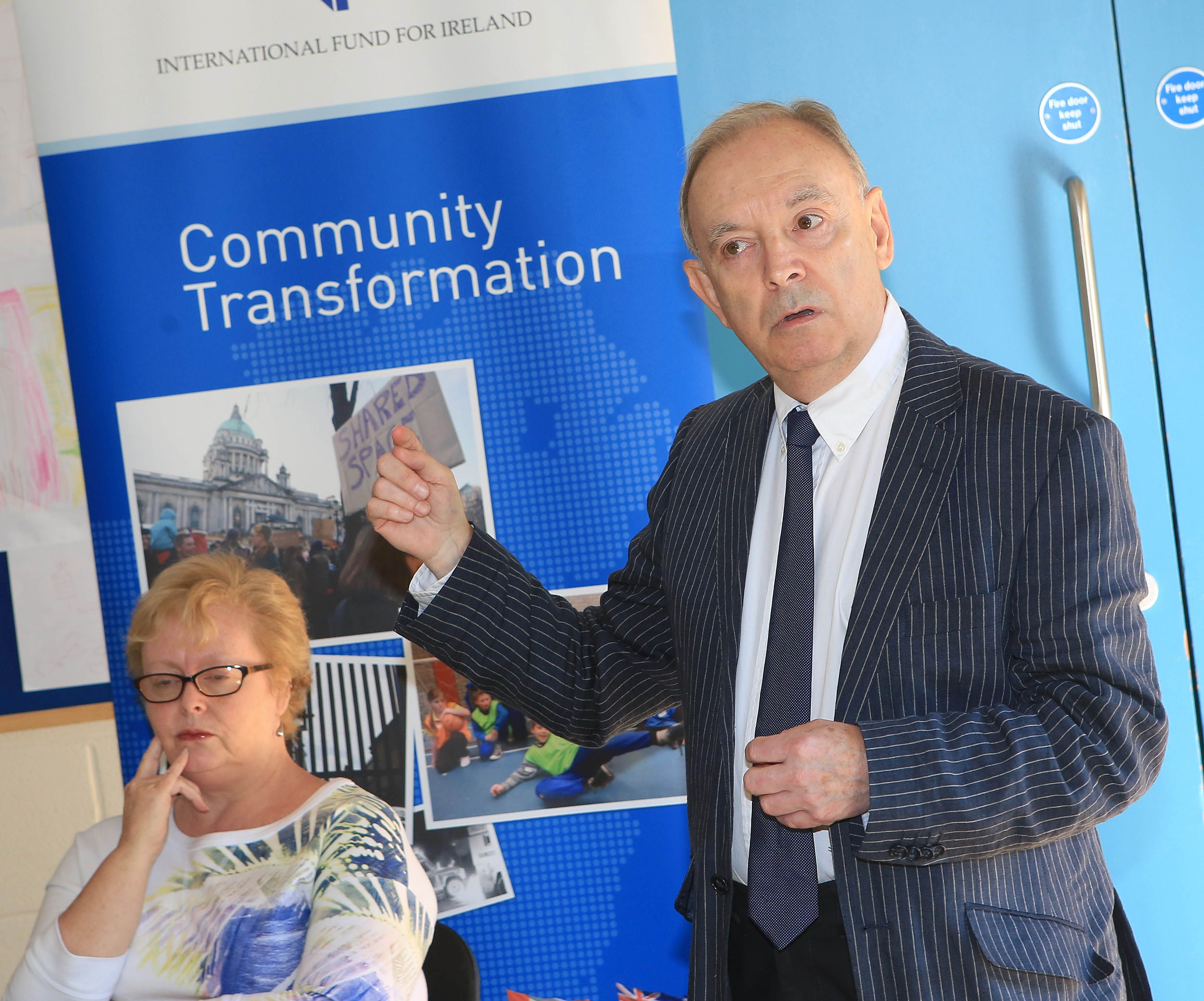 CROSS-COMMUNITY: Billy Gamble, board member of the International Fund for Ireland, addressing a peaceline launch of an IFI initiative in Belfast back in 2014. Future funding of bridge-building initiatives by the US now seems unlikely