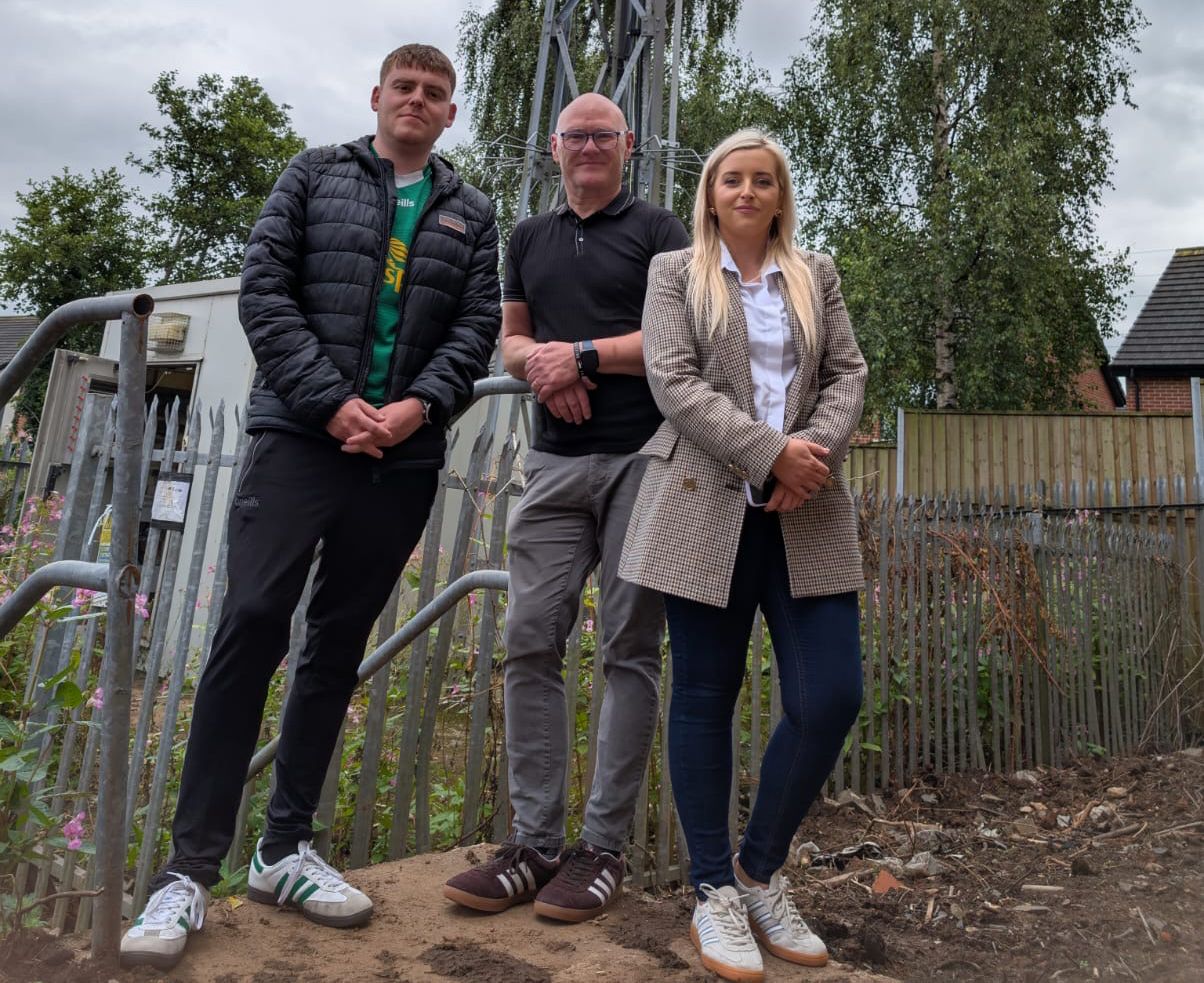 ATTACK: West Belfast MP Paul Maskey with MLA Órlaithí Flynn and Cllr Ronan McLaughlin at the mast