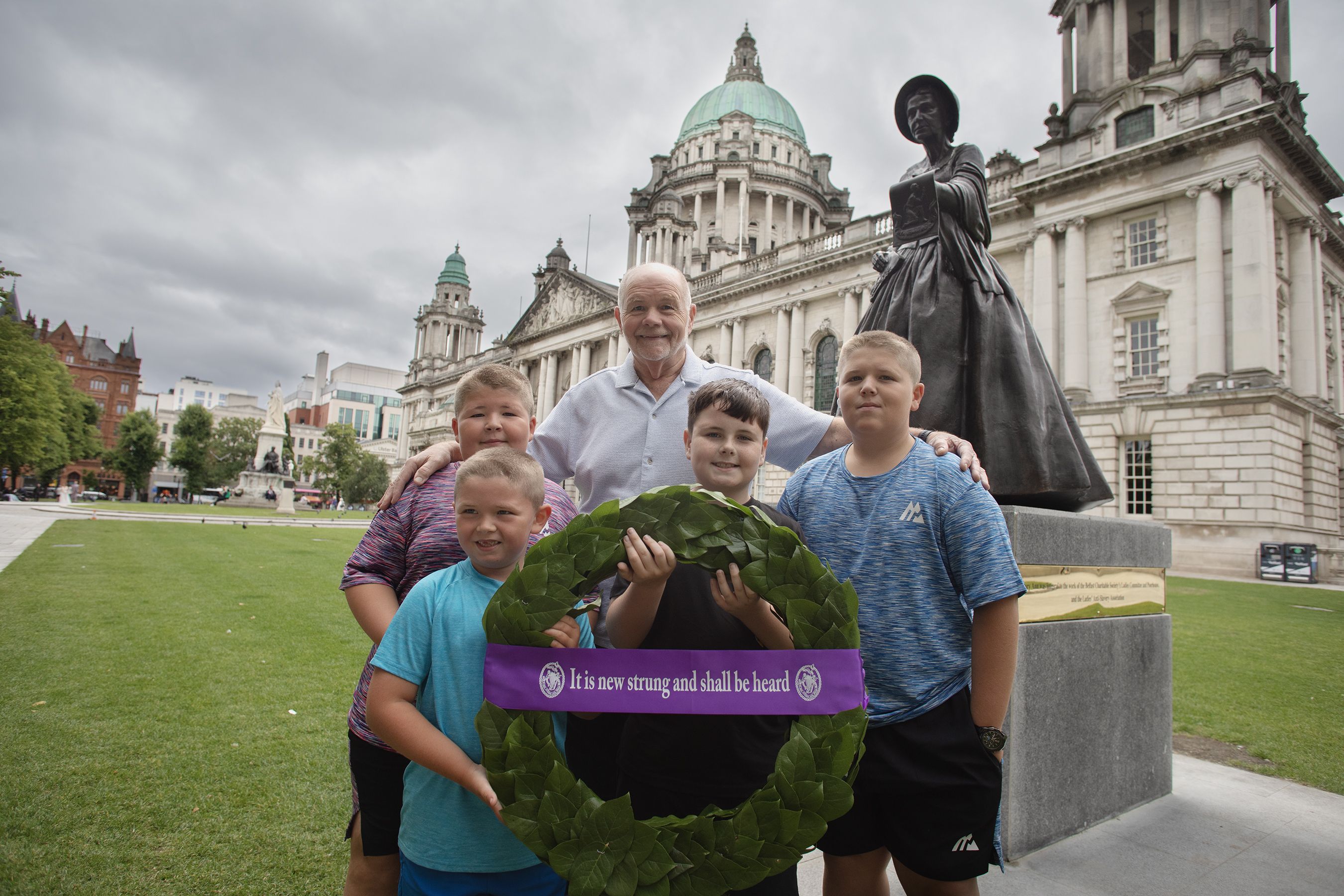 ANNIVERSARY: Harry Hanley with Codie Monaghan, Jayden Monaghan, Noah Hanley and Conor Monaghan with the wreath laid in memory of Mary Ann McCracken