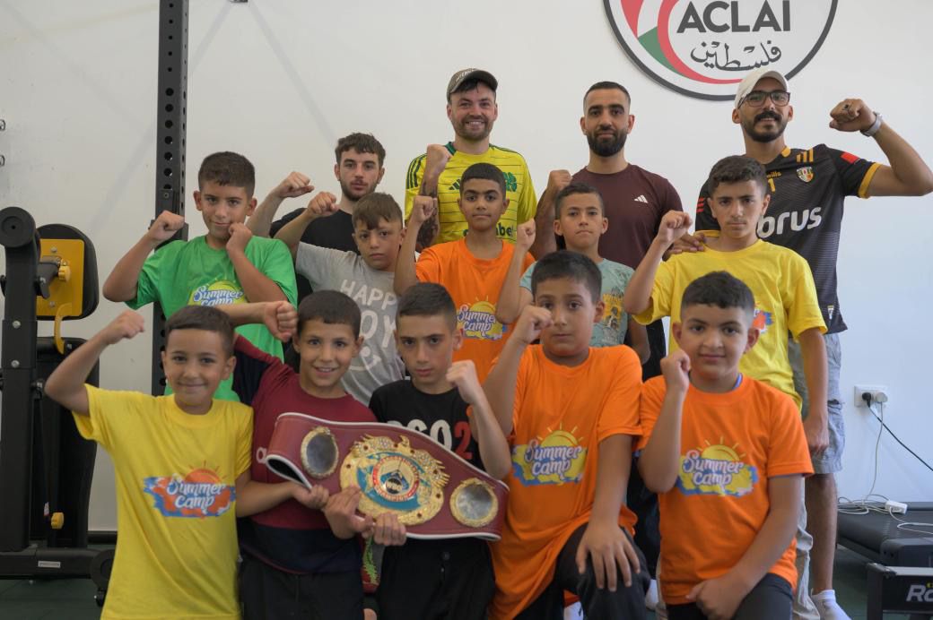 Young Palestinian boxers with Tyrone McKenna