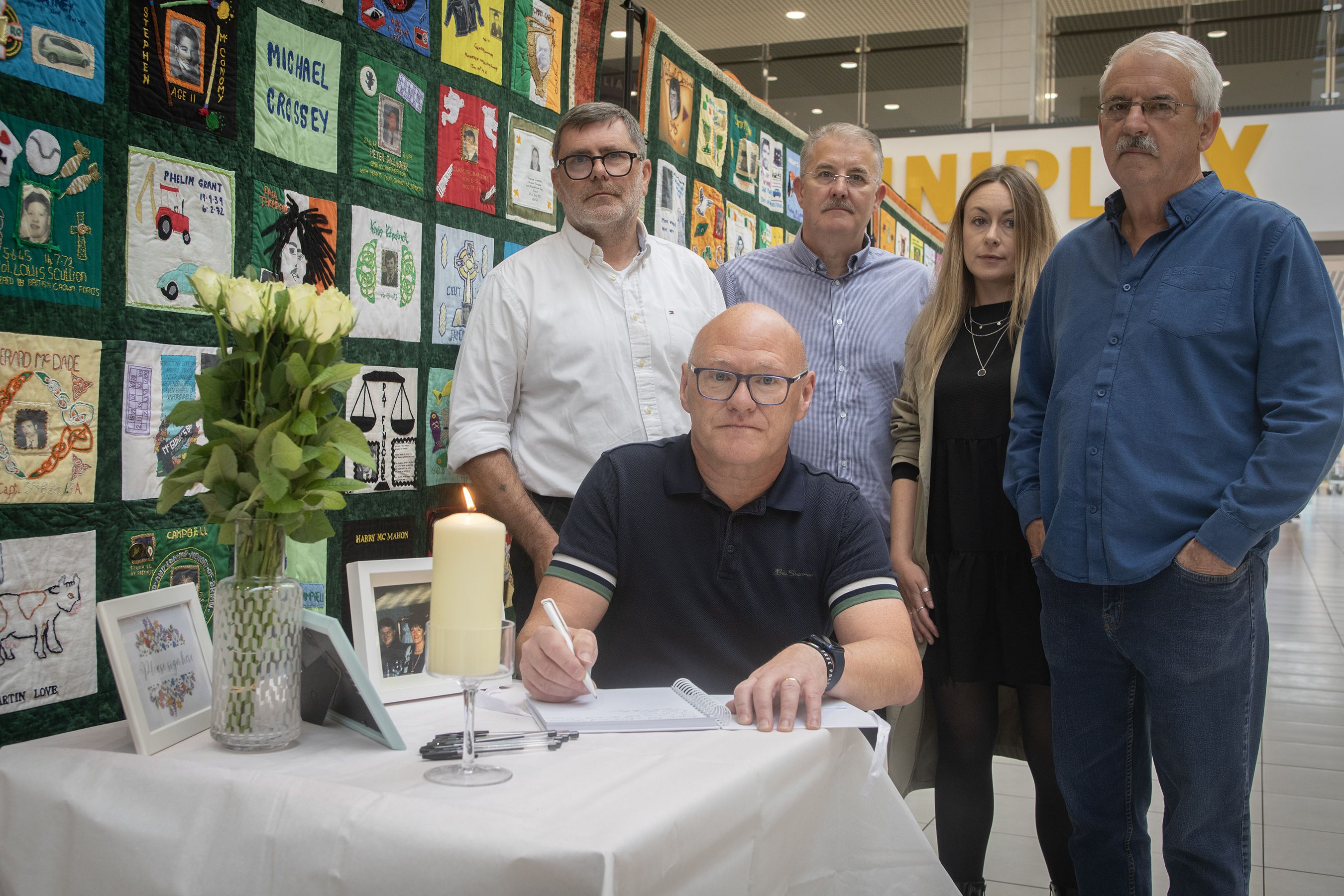 TRIBUTES: Paul Maskey MP, Mark Thompson and Irati Oleaga from RFJ with Tommy Holland and Ciarán Cahill from Springhill Community House 