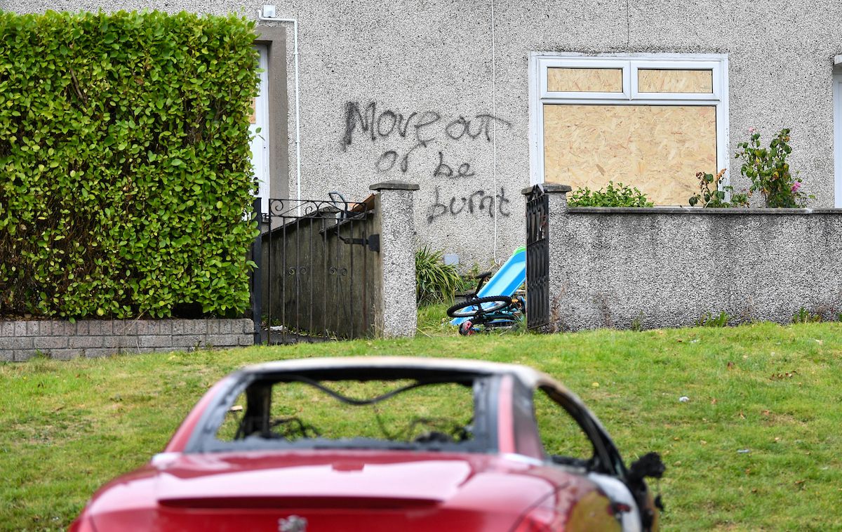 RACIST ATTACK: Two cars were set alight, while damage was caused to a window and door at a nearby property, which was also targeted with graffiti.