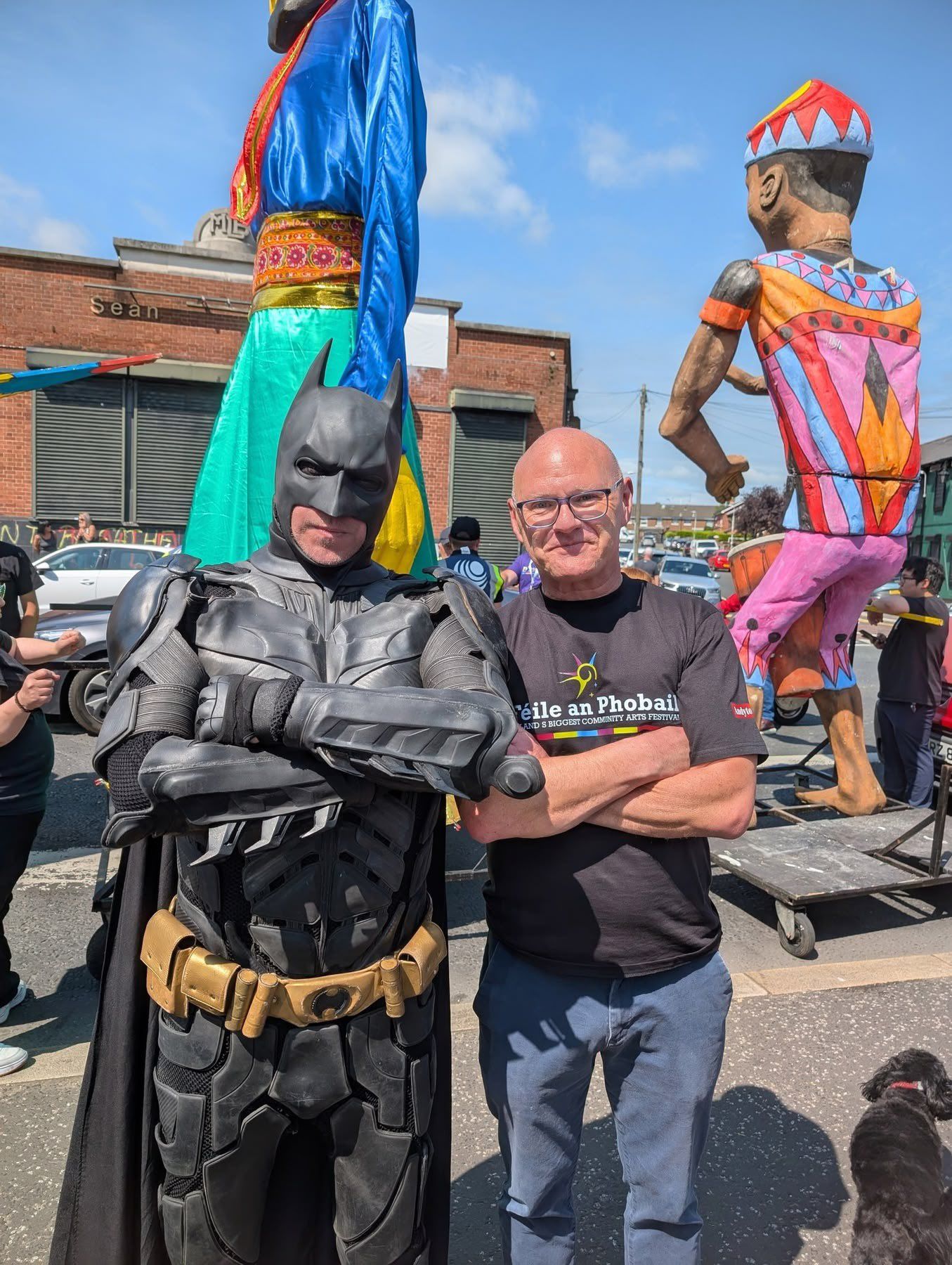 CARNIVAL FUN: Paul Maskey MP with the Caped Crusader at the Féile Carnival Parade