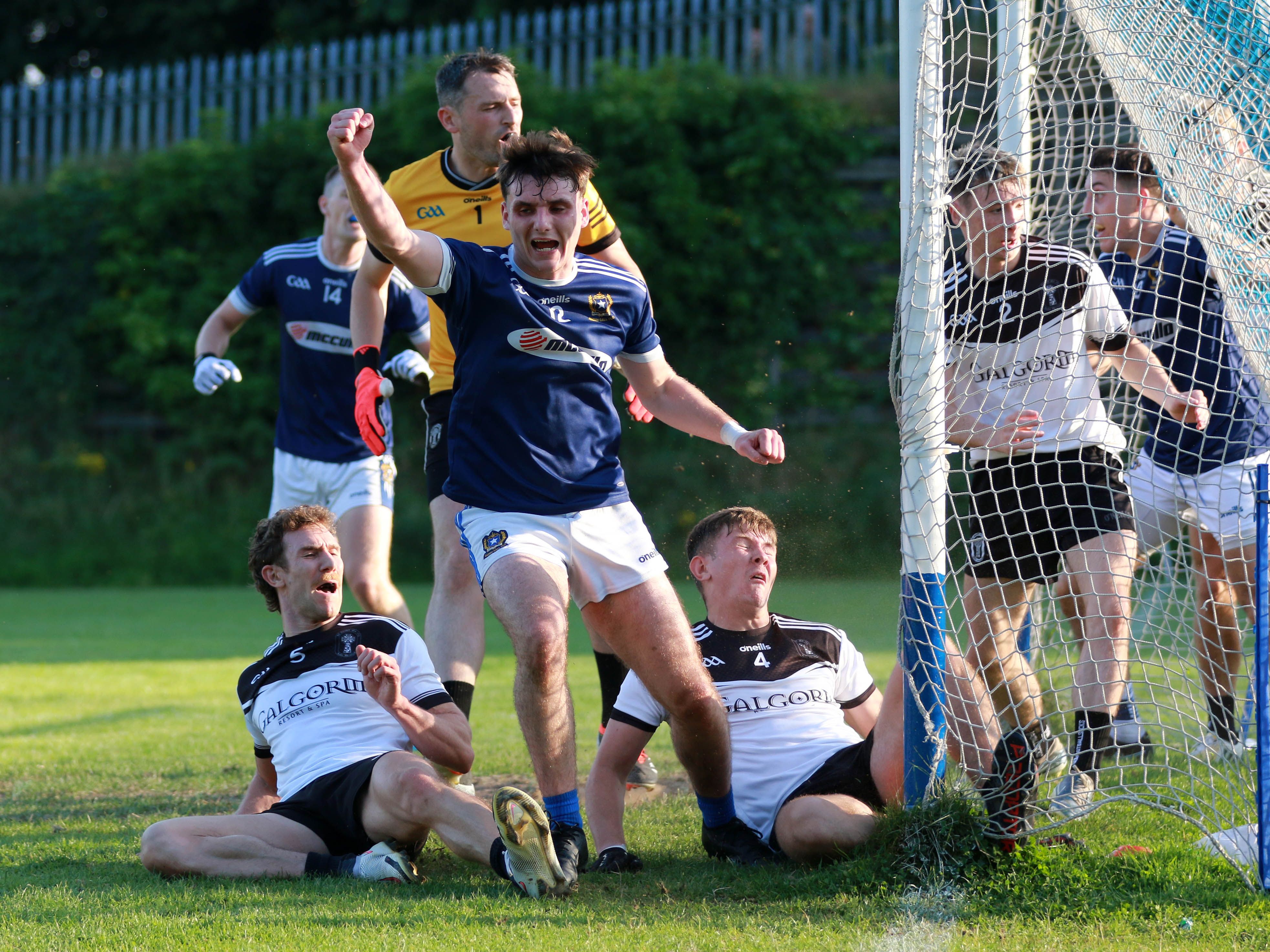 BIG GOAL: Callum Walsh celebrates as he scrambles the ball over the line for St Gall\'s