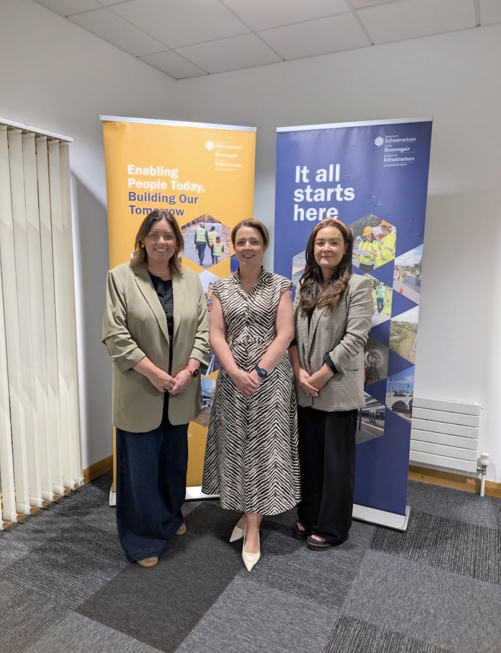 TEAMWORK: South Belfast MLA Deirdre Hargey and Councillor Natasha Brennan with Infrastructure Minister Liz Kimmins