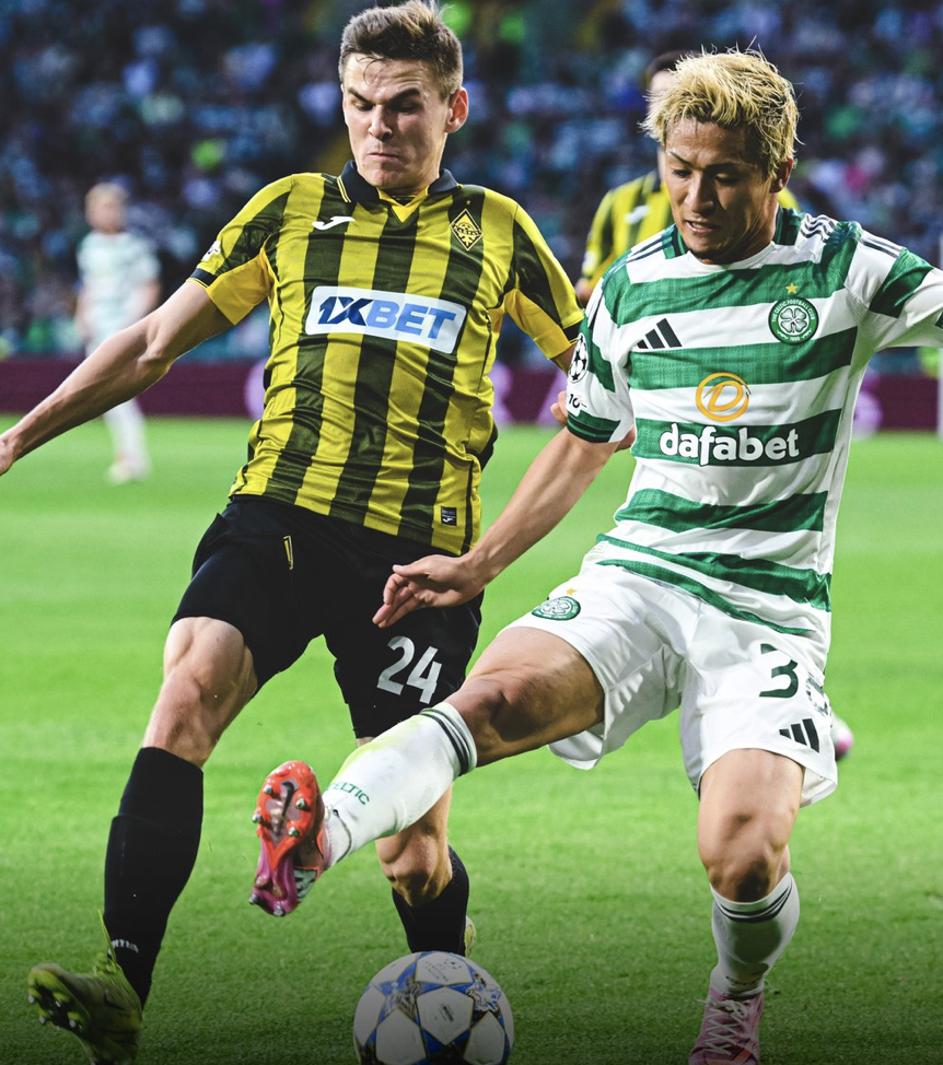 ALL SQUARE: Kairat defender Aleksandr Myrnskiy puts in a challenge on Celtic attacker Daezan Maeda during last night\'s frustrating 0-0 draw in Glasgow
