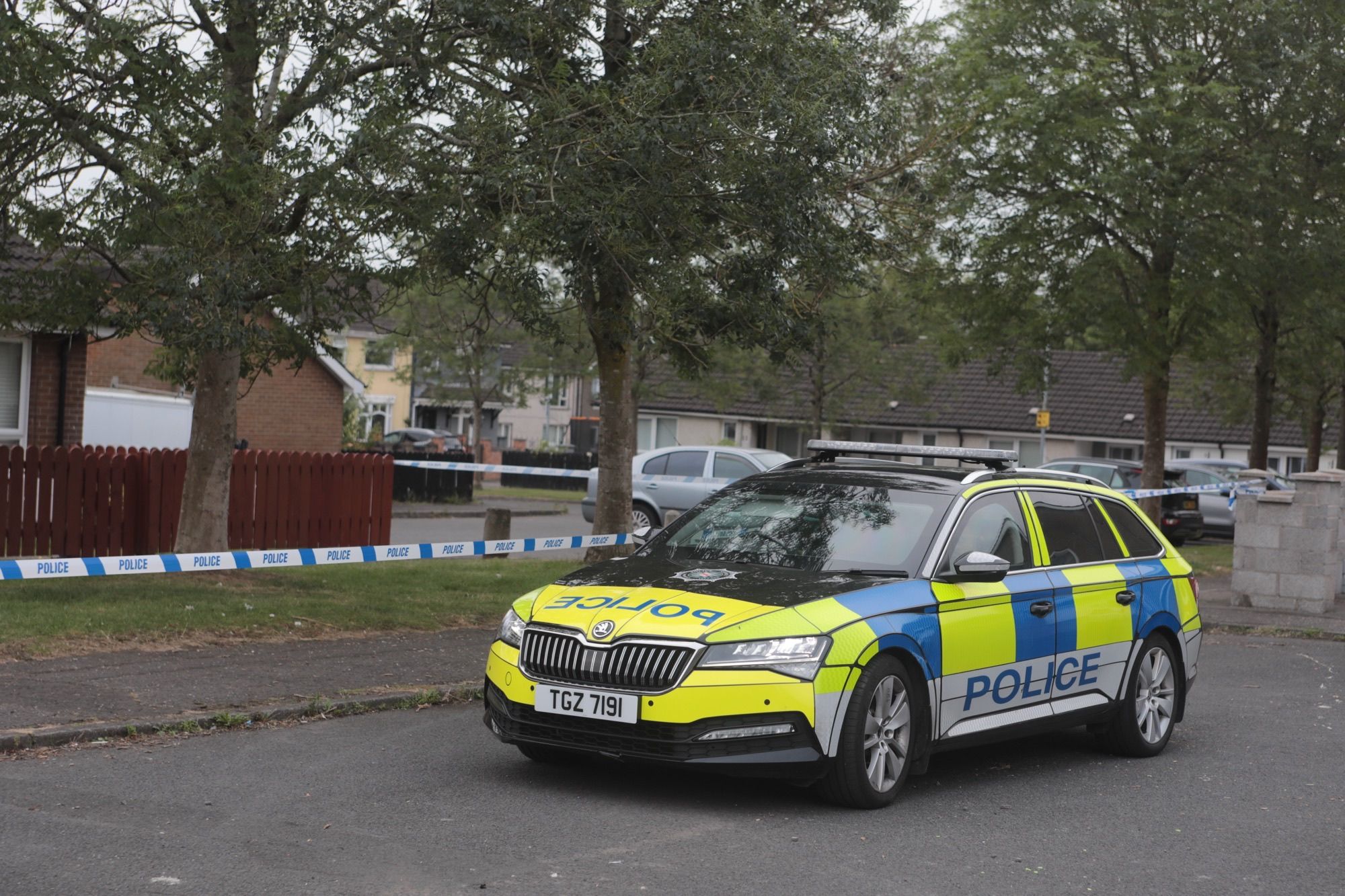 MURDER: Police have cordoned off Mulberry Park in Twinbrook